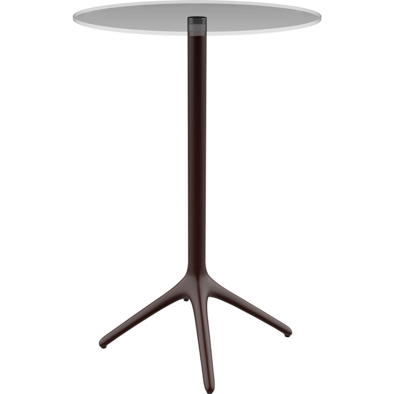 Uni chocolate table 105 by Mowee.
Dimensions: D45.5 x H105 cm.
Material: Aluminium, tempered glass.
Weight: 6.2 kg.
Also Available in different colours and finishes.Collapsable version available. 

A table designed to be as versatile as