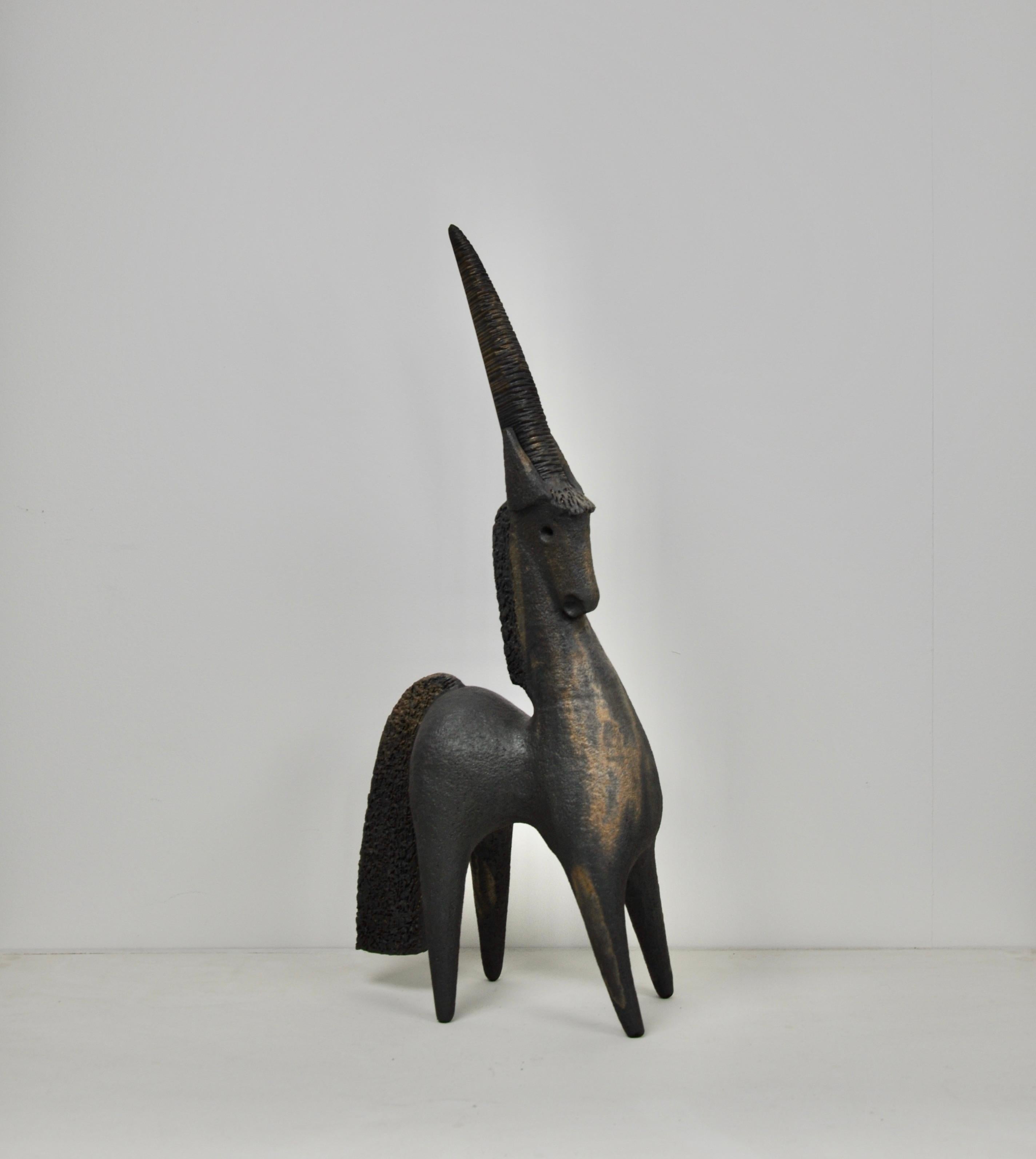 Ceramic in the shape of a unicorn stamped Dominique Pouchain.