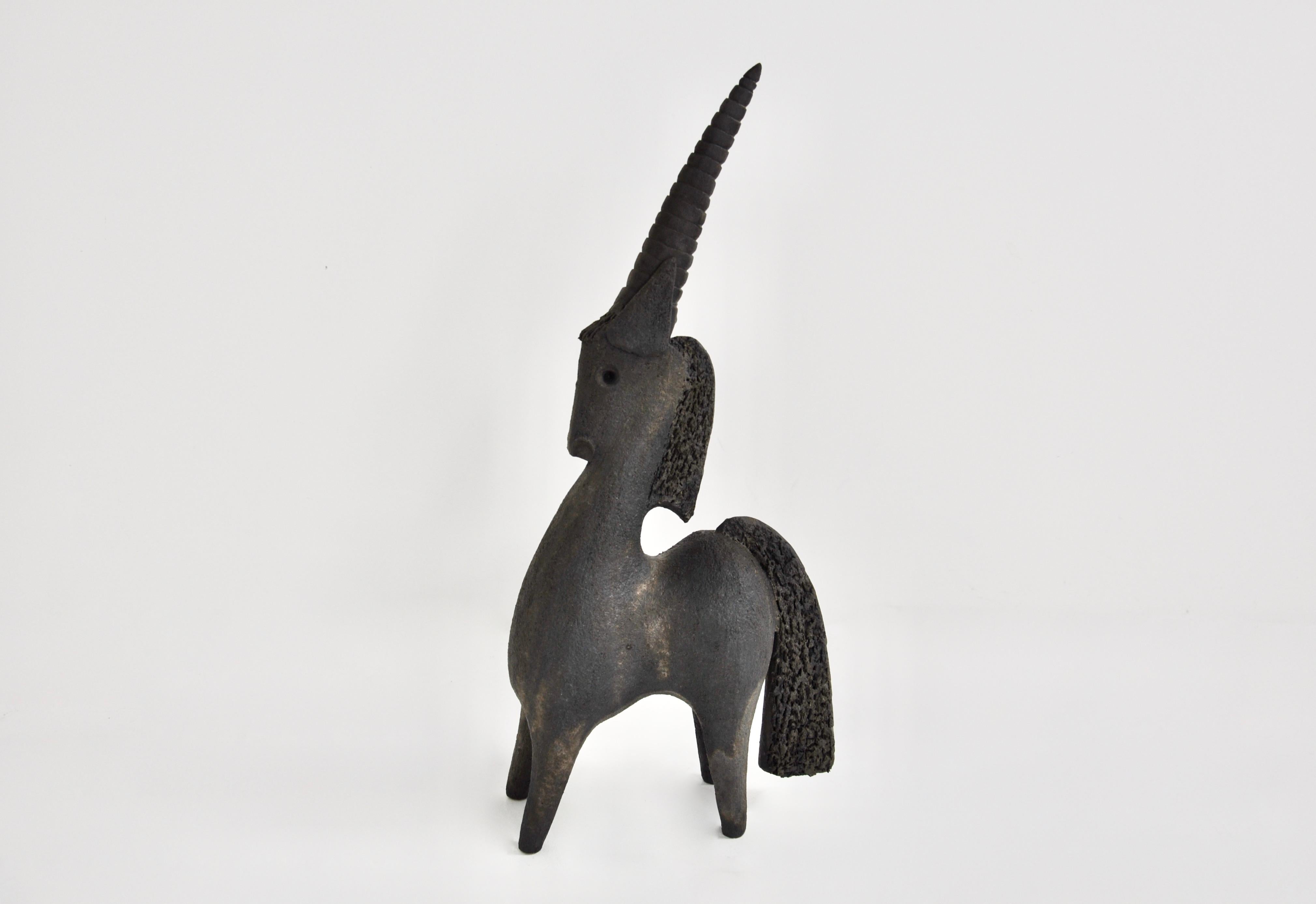 Ceramic in the shape of a unicorn designed by Dominique Pouchain. Stamped on the back.