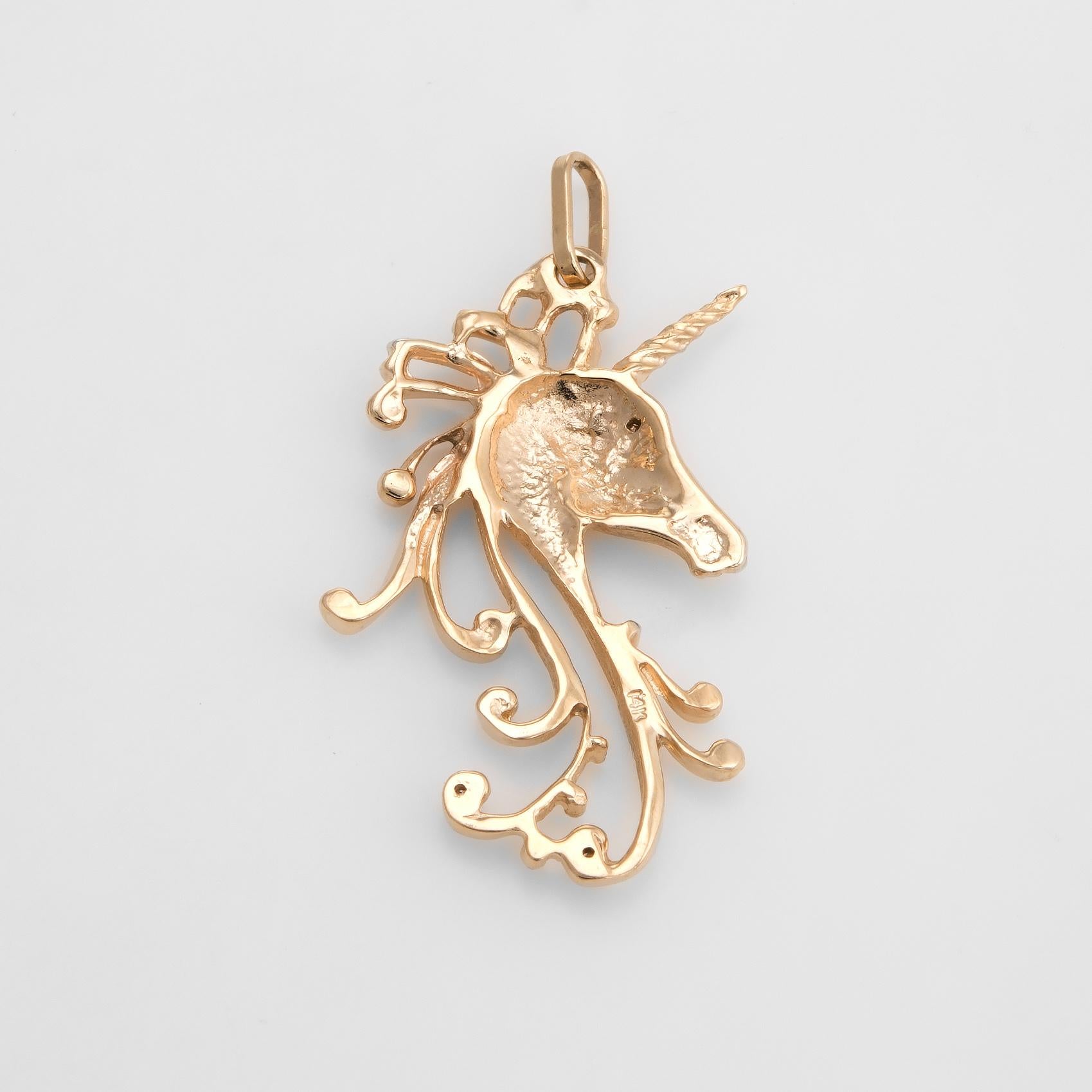 Finely detailed unicorn pendant, crafted in 14 karat yellow gold. 

Single cut diamond is estimated at 0.01 carats (estimated at H-I color and SI1 clarity). 

The pendant is in excellent original condition. 

Particulars:

Weight: 4 grams

Stones: 
