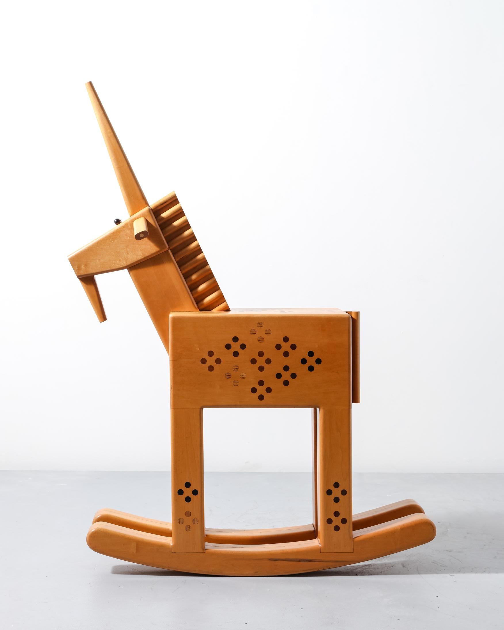 Unicorn Rocker in acero, ebano, purpleheart, harewood e zebrano. Progettato e realizzato da Pamela Weir-Quiton, USA, 1971.