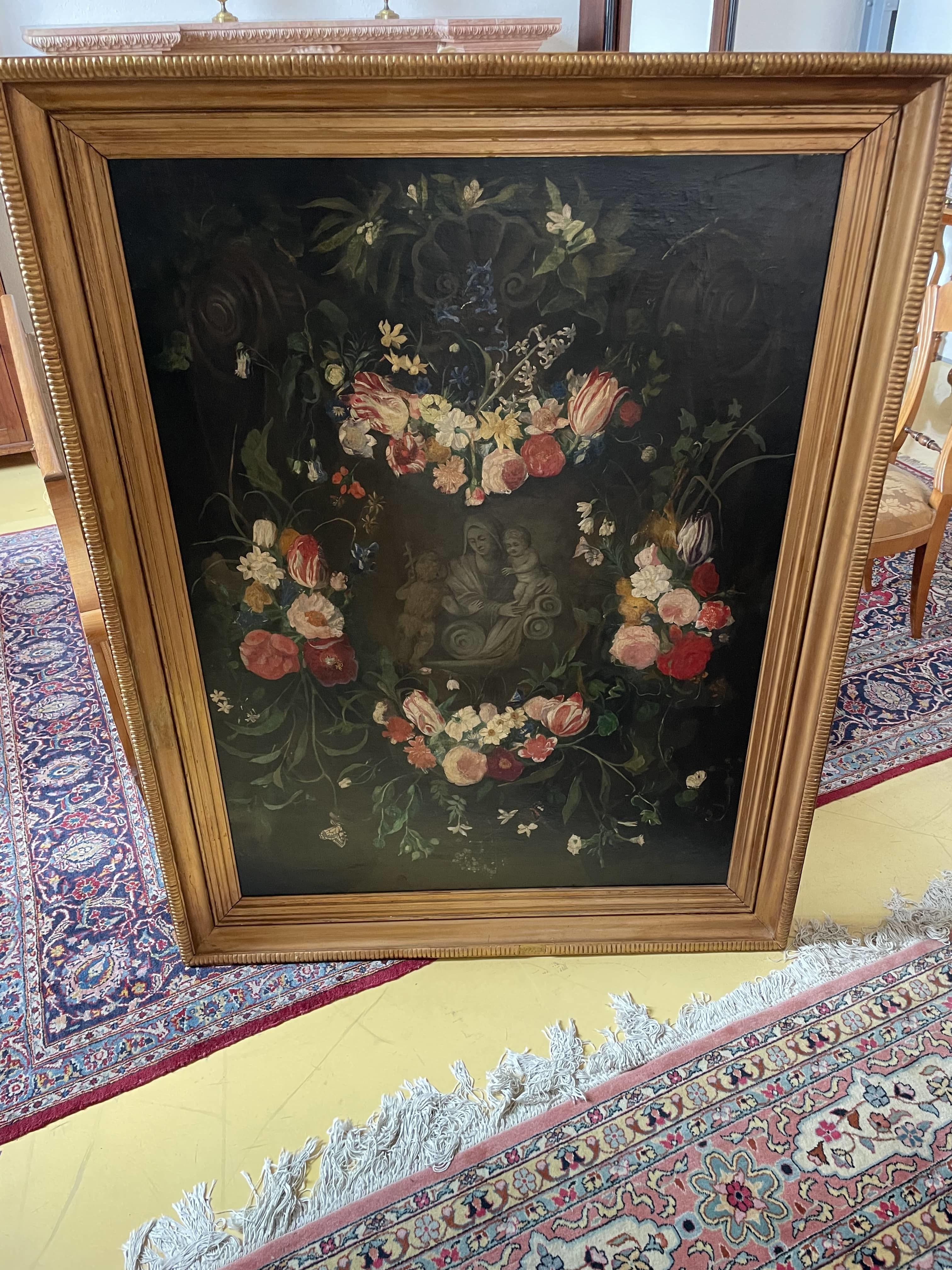 Ghirlanda floreale con immagini sacre Periodo: Probabilmente XVII-XVIII secolo Medium: Olio su tela Stile: Barocco fiammingo o olandese Cornice: Cornice in legno antico Questo squisito dipinto a olio è uno splendido esempio della tradizione barocca