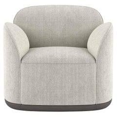 Unio Armchair Upholstered with the Larsen Fox Fabric by Poiat
