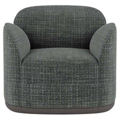 Fauteuil Unio tapiss de tissu Chivasso Yang de Poiat