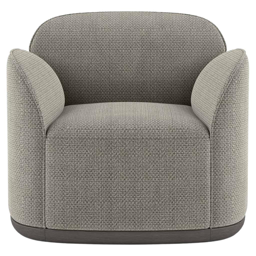 Unio Armchair Upholstered with Pierre Frey Hanoi Fabric by Poiat