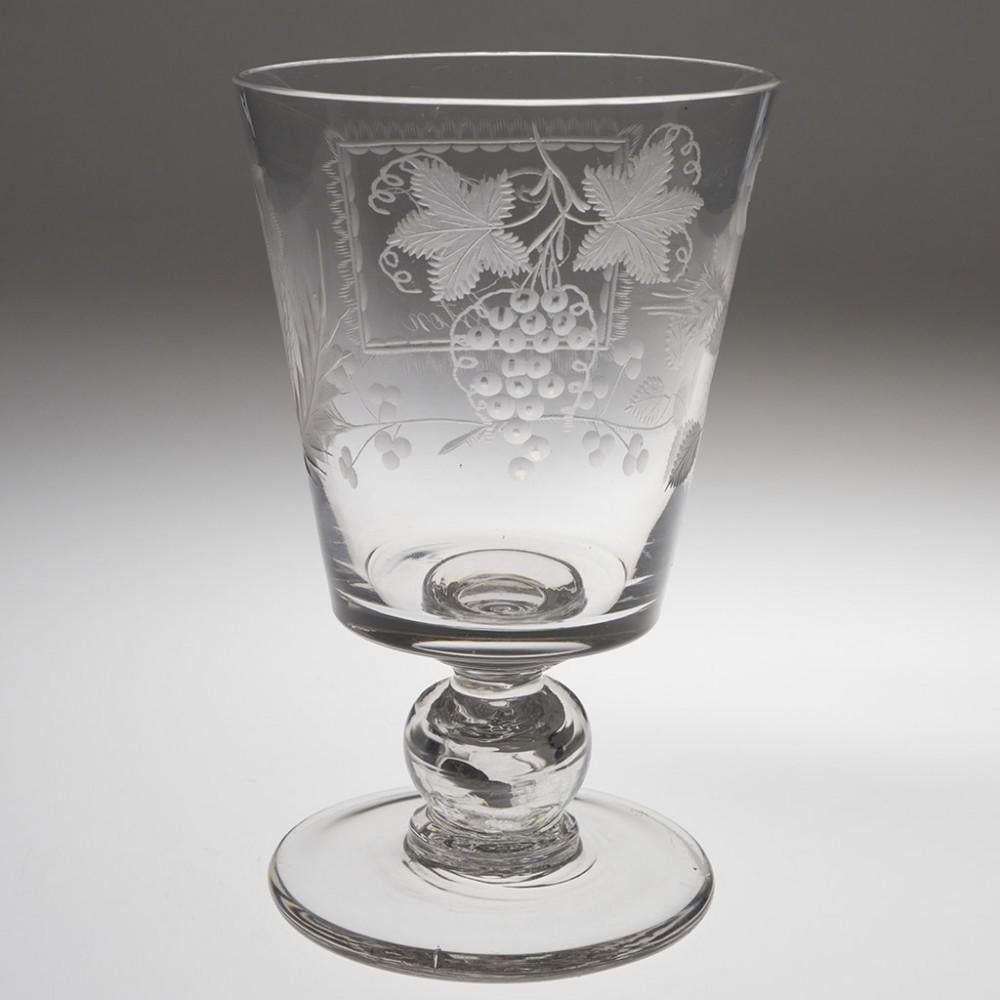 Heading : Union engraved coin rummer
Period : Victoria - c1850
Origin : England
Colour : Clear
Bowl : Bucket - engraved with a cartouche containing the mongram HJ and 'Alston.' This is surrounded by a flowering rose and a thistle. To the reverse is