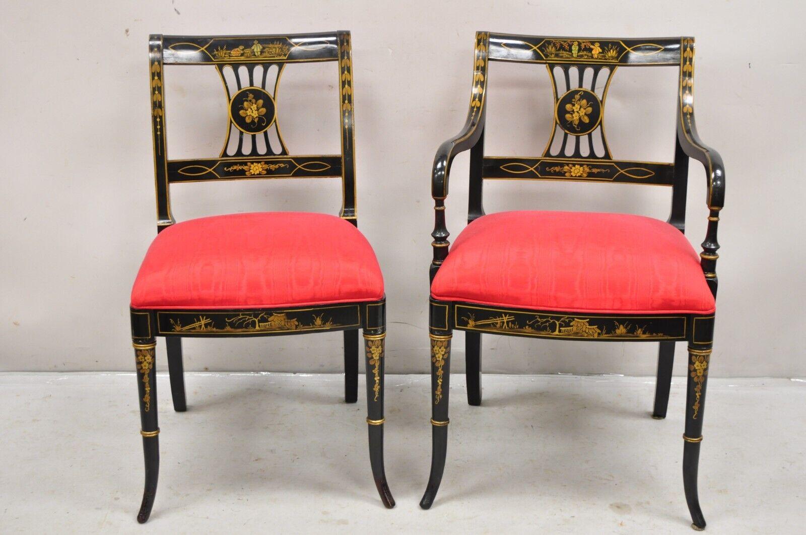 Set of 6 Vintage Chinoiserie English Regency Style Black Hand Painted Dining Chairs. Believed to be by Union National Furniture Co. Set includes 2 Armchairs, 4 side chairs, hand painted details, saber legs, red upholstered seats, very nice quality