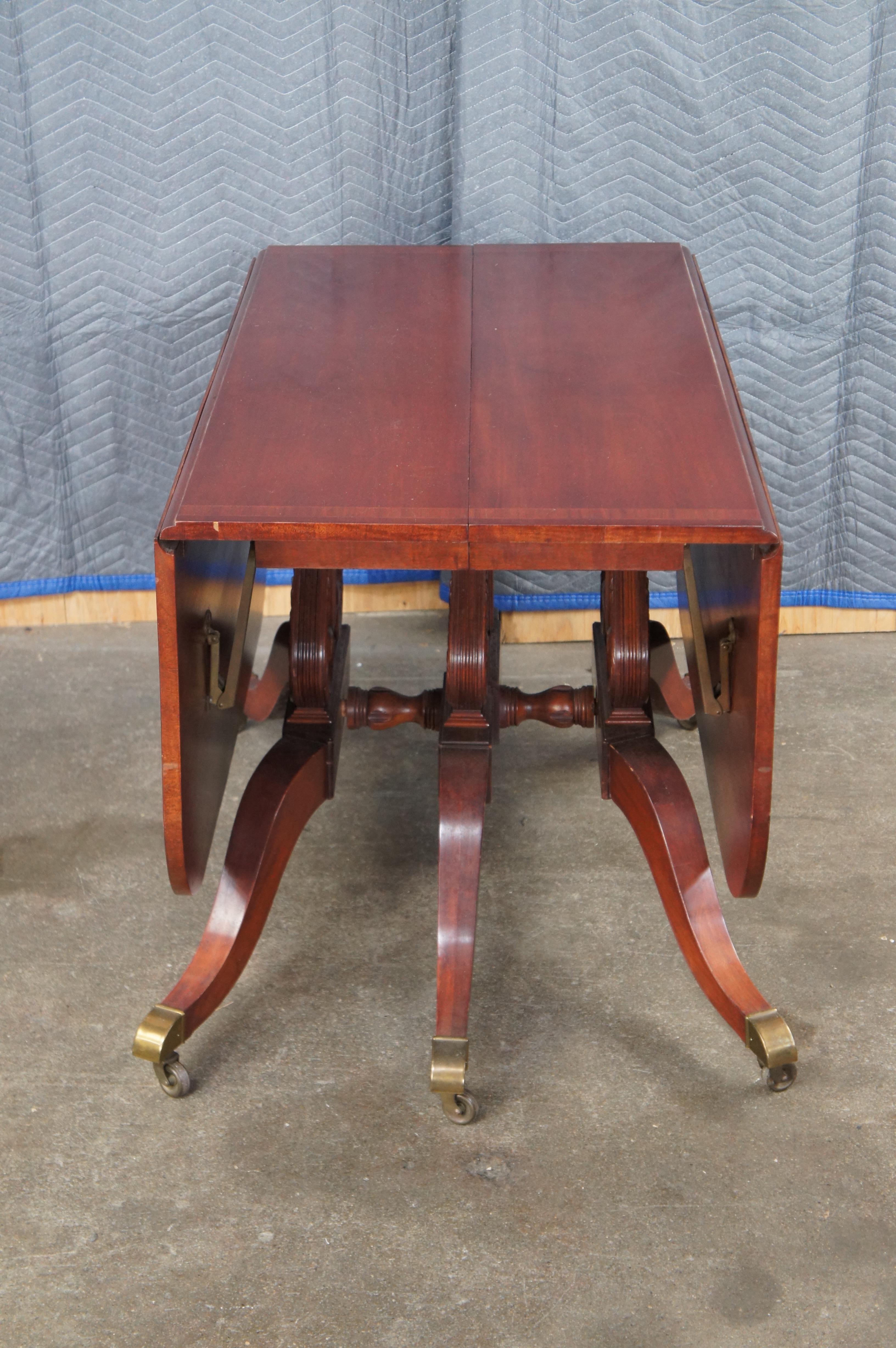 American Union National Mid Century Duncan Phyfe Style Mahogany Drop Leaf Dining Table For Sale