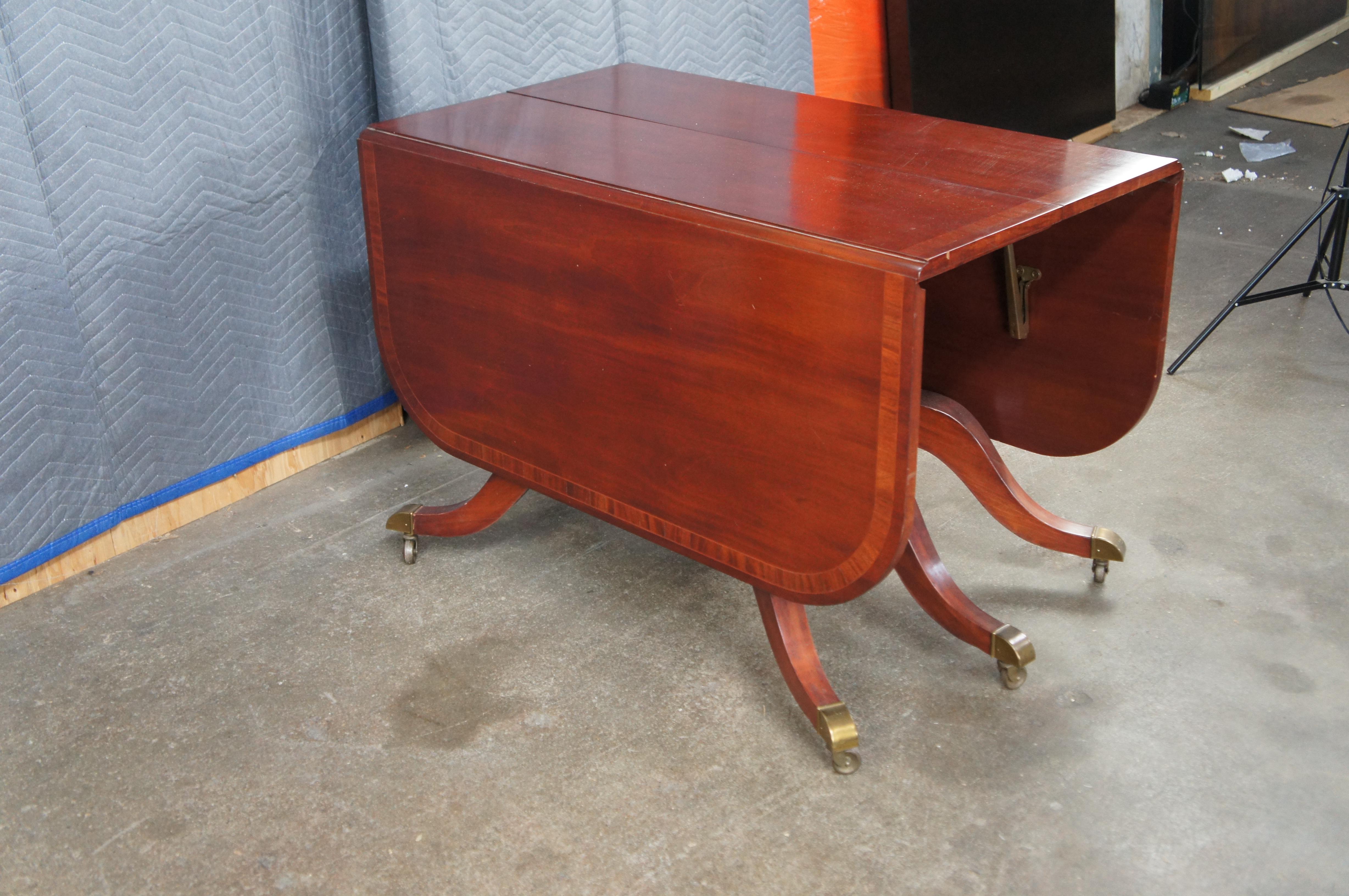 Union National Mid Century Duncan Phyfe Style Mahogany Drop Leaf Dining Table In Fair Condition For Sale In Dayton, OH