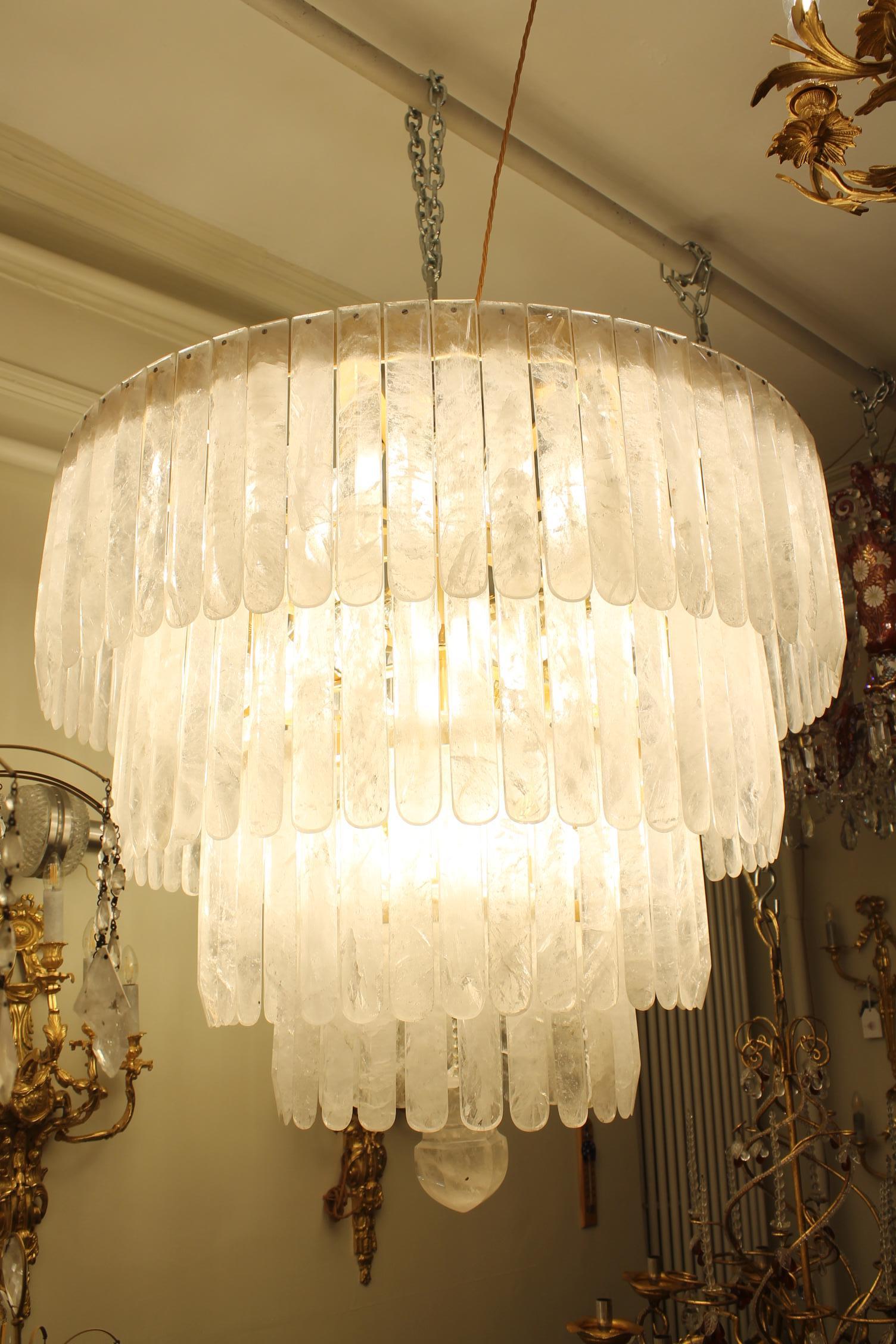 Bronzed  Uniqe exceptional pair of rock crystal chandeliers For Sale