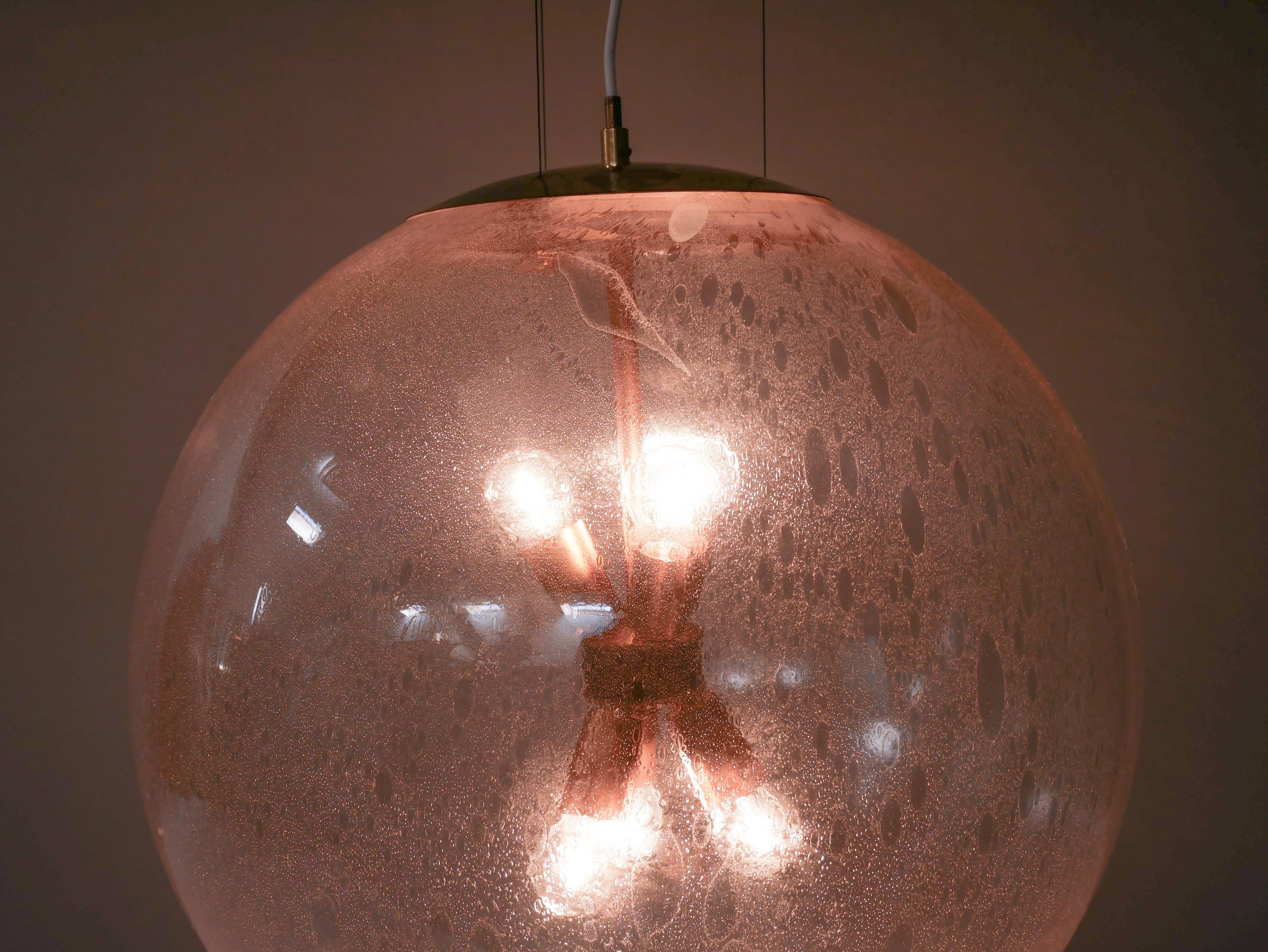 Hans-Agne Jakobsson wire suspended lamp.
This model was designed and manufactured specially for the Swedish pharmaceutical company Leo in Helsingborg in the early 1960s.
There was only five made of these and they hanged in a group in their main