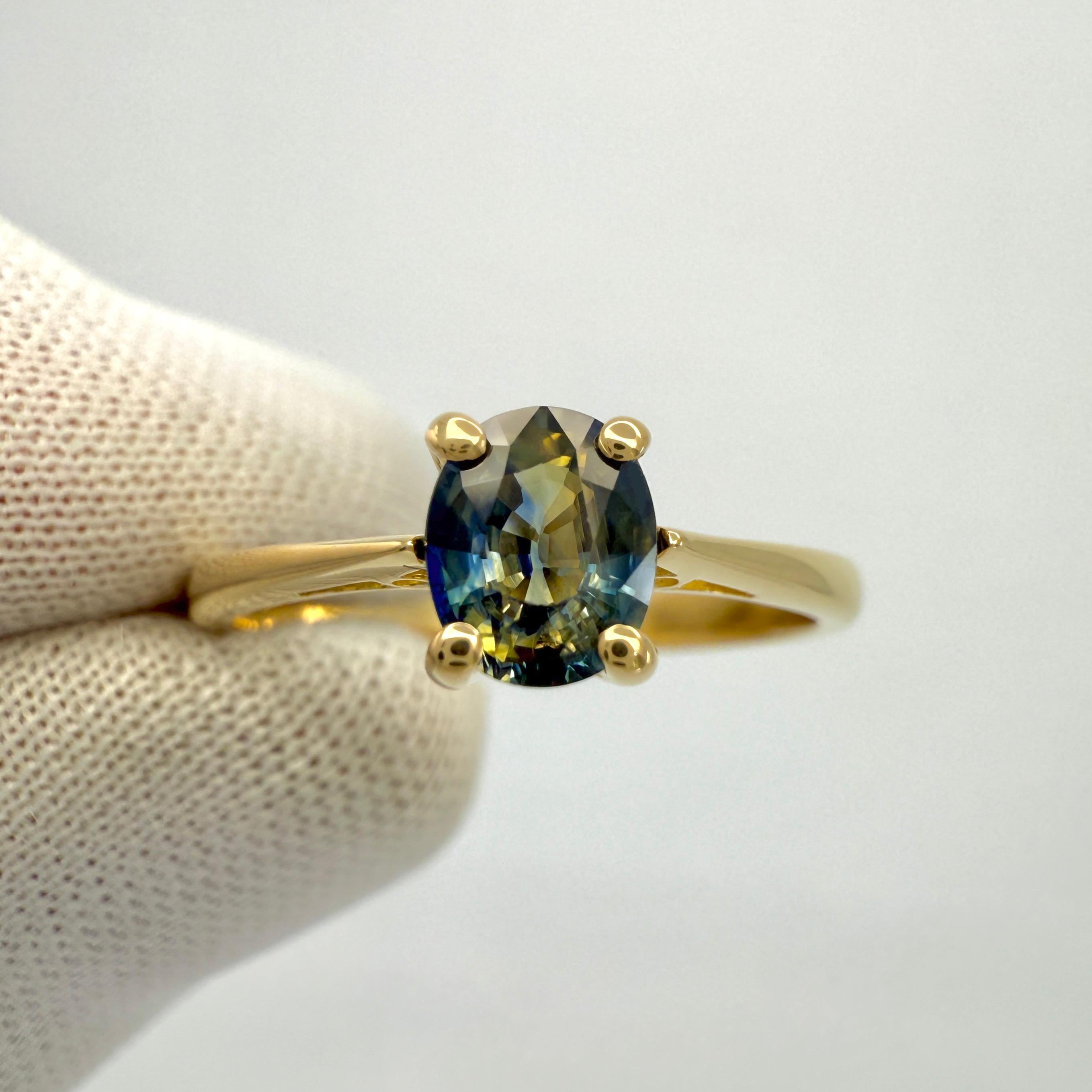 Einzigartiger natürlicher zweifarbiger blauer & gelber Ceylon Saphir 18k Gelbgold Ring.

Dieser wunderschöne Ring zeigt einen natürlichen 0,85ct Saphir mit einem einzigartigen blauen und gelben Zweifarbeffekt und Ceylon (Sri Lanka Ursprung) Unique