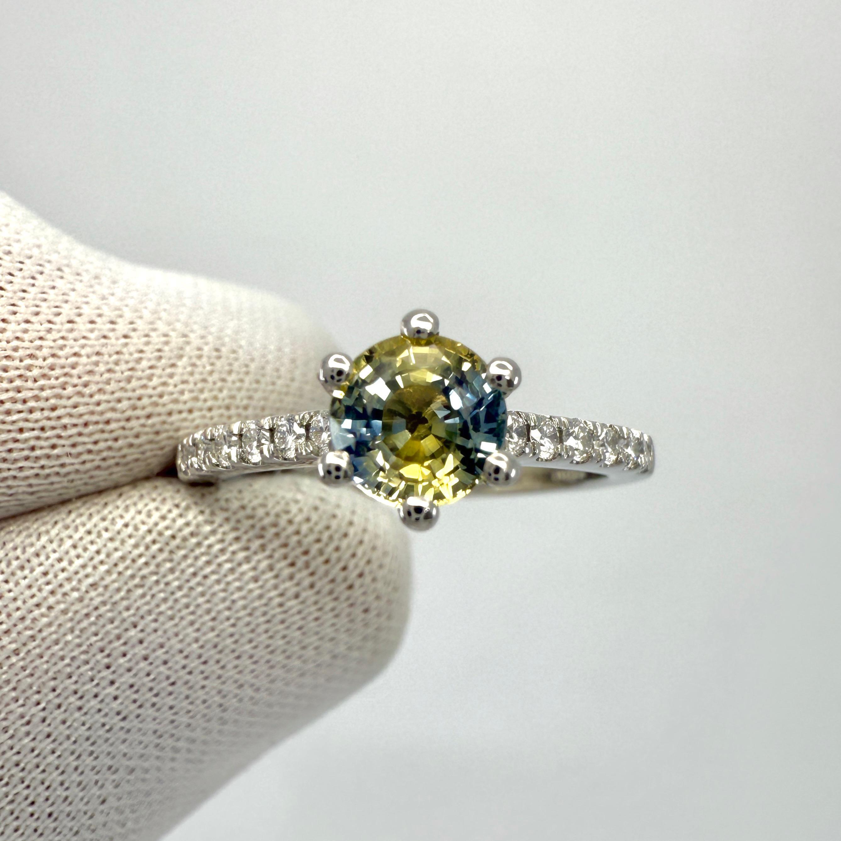 Unique Natural Bi Colour Blue & Yellow Sapphire And Diamond Platinum Ring. 1.05 Carat total.

This beautiful ring features a natural 0.90ct sapphire with a unique blue and yellow bi colour effect. Unique gemstone. This also has an excellent round