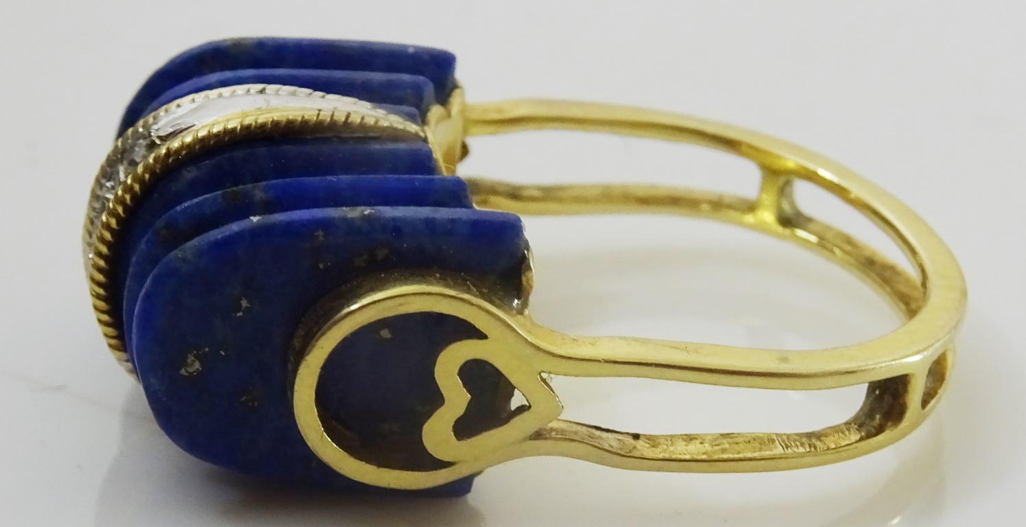 Unique 14 karat Gold Carved Lapis Lazuli Tank Ring In Good Condition For Sale In Jerusalem, IL