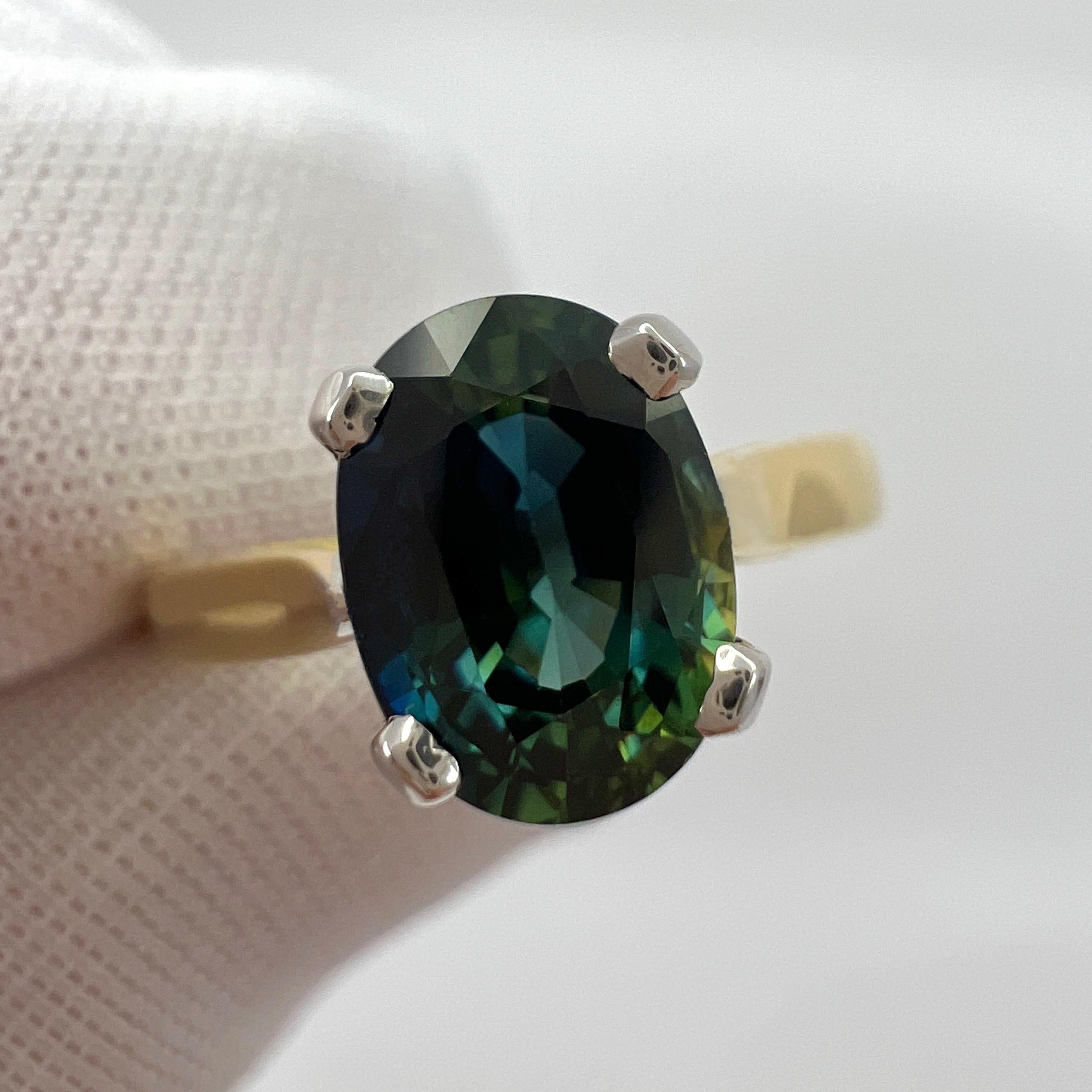 Unique 1.46 Carat Bi Colour Sapphire Blue Green Oval Cut 18k Gold Solitaire Ring In New Condition For Sale In Birmingham, GB