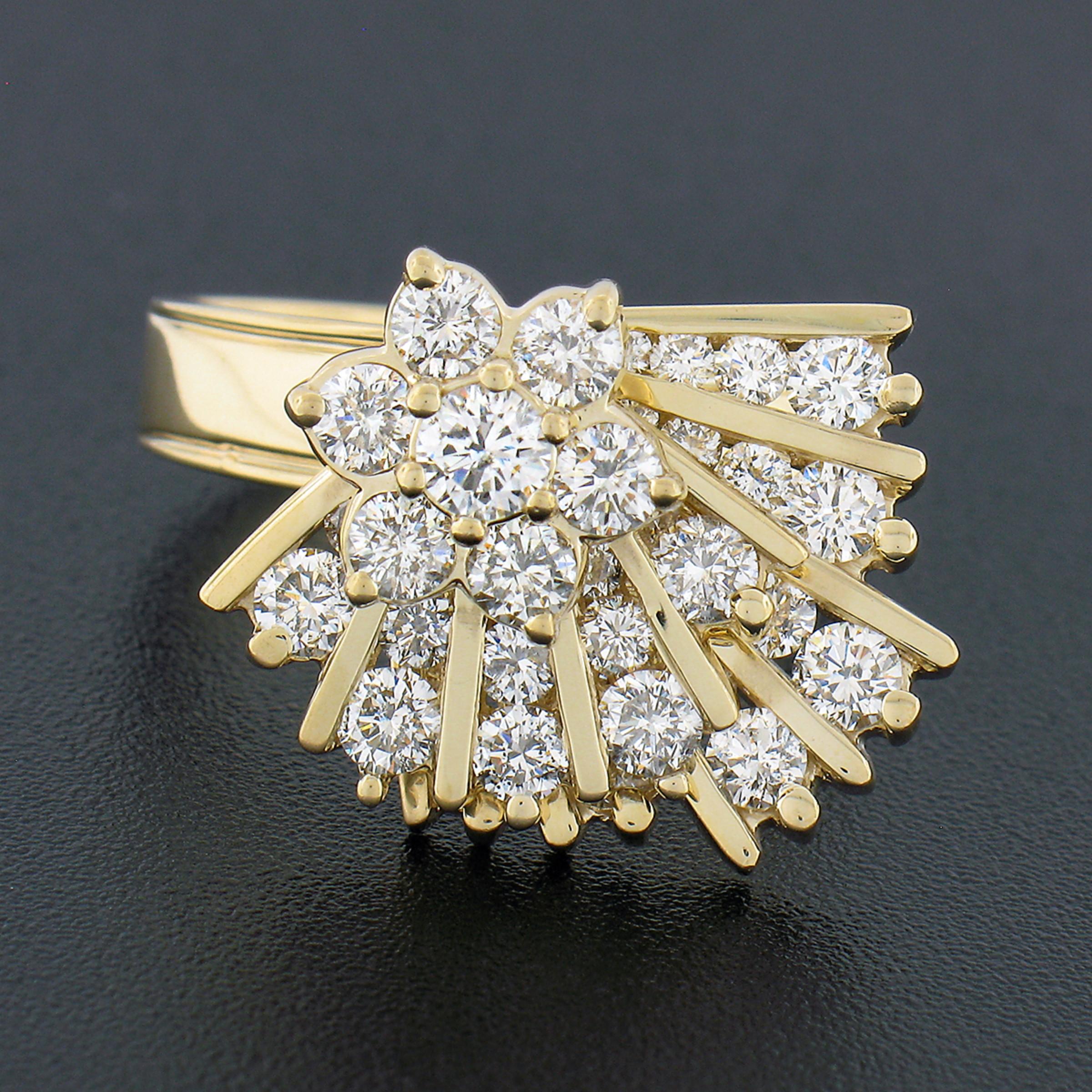 Here we have a magnificent and unique diamond cocktail ring that was crafted from solid 14k yellow gold. It features absolutely breathtaking round brilliant cut diamonds that are neatly set in a flower cluster at the top as well as cover two fully