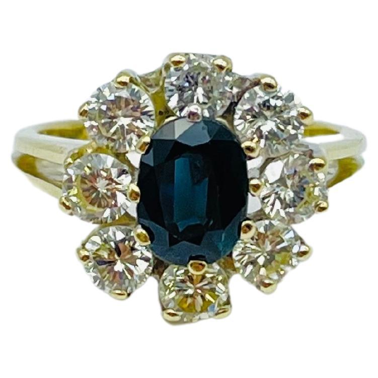 Unique 14k gold Princess Diana ring with 8 brilliant-cut diamonds each 0.15 ct and blue sapphire

This breathtaking ring is a tribute to the timeless elegance of Princess Diana's iconic engagement ring. Crafted from luxurious 14k yellow gold, the