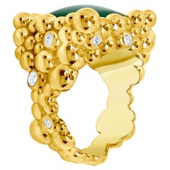 Anillo único de oro de 14k con diamantes y jade