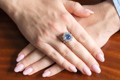 Unique 14k white gold ring with an untreated natural sapphire and diamonds.