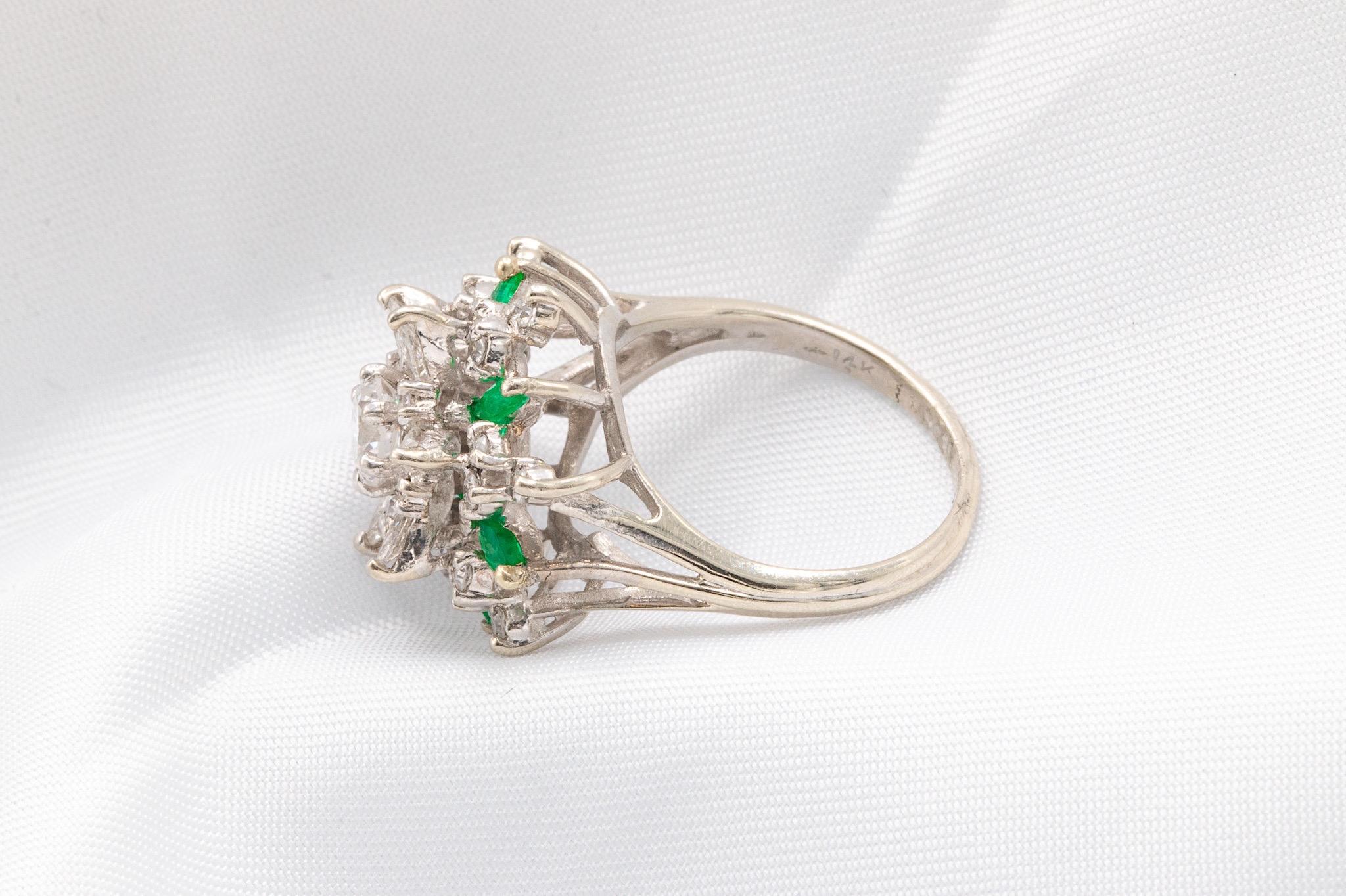 This beautifully renewed vintage-inspired cluster ring is crafted in 14K white gold, weighing 5.3 grams and currently sized at 5.75, with resizing options available. The centerpiece features brilliant round-cut diamonds totaling approximately 0.50
