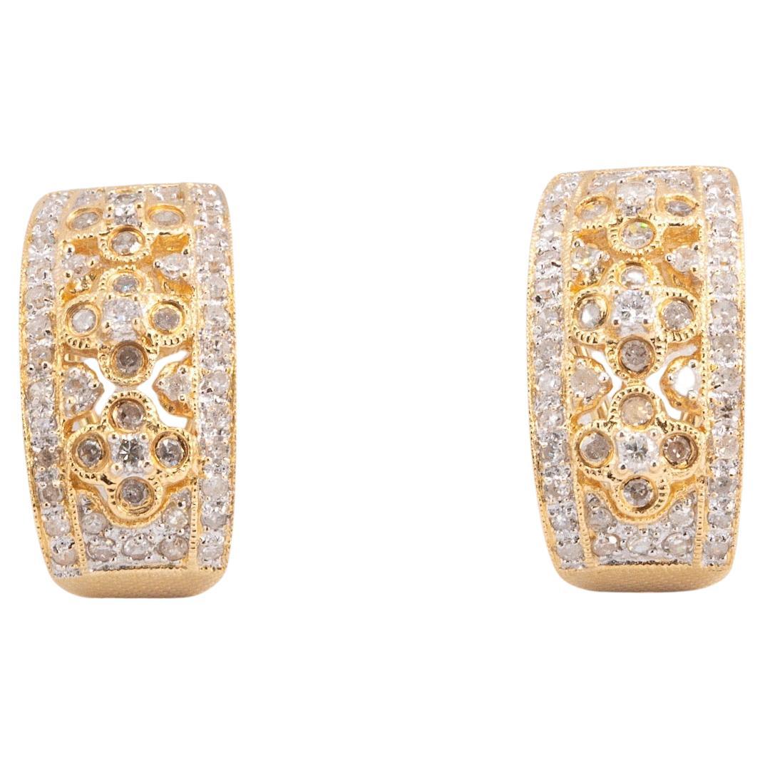 Pendientes únicos de diamantes de oro amarillo de 14k