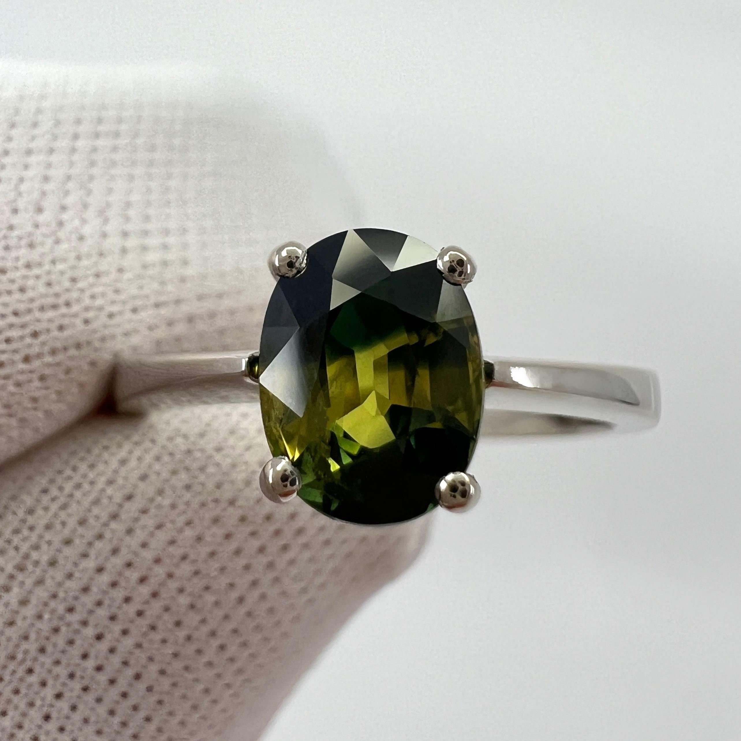 Unique Bi Colour Australian Sapphire 18k White Gold Solitaire Ring.

1.52 Carat stone with a stunning unique bi-colour effect.
Yellow and blue colour split, rare and stunning to see.

Also has very good clarity, clean stone with only some small