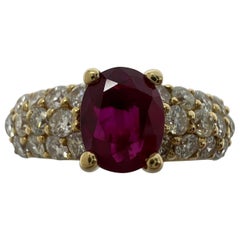 Unique 1.61 Carat Deep Red Ruby Diamond Oval 18k Yellow Gold Cluster Ring Unique 1.61 Carat Deep Red Ruby Diamond Oval 18k Yellow Gold Cluster Ring