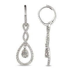 Unique 18 Karat White Gold and Diamond Earring