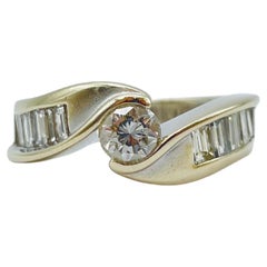 Einzigartiger Ring aus 18 Karat Gold, 0,50 Karat Diamant und 8 Baguette-Diamanten, Weiß-/Gelbgold