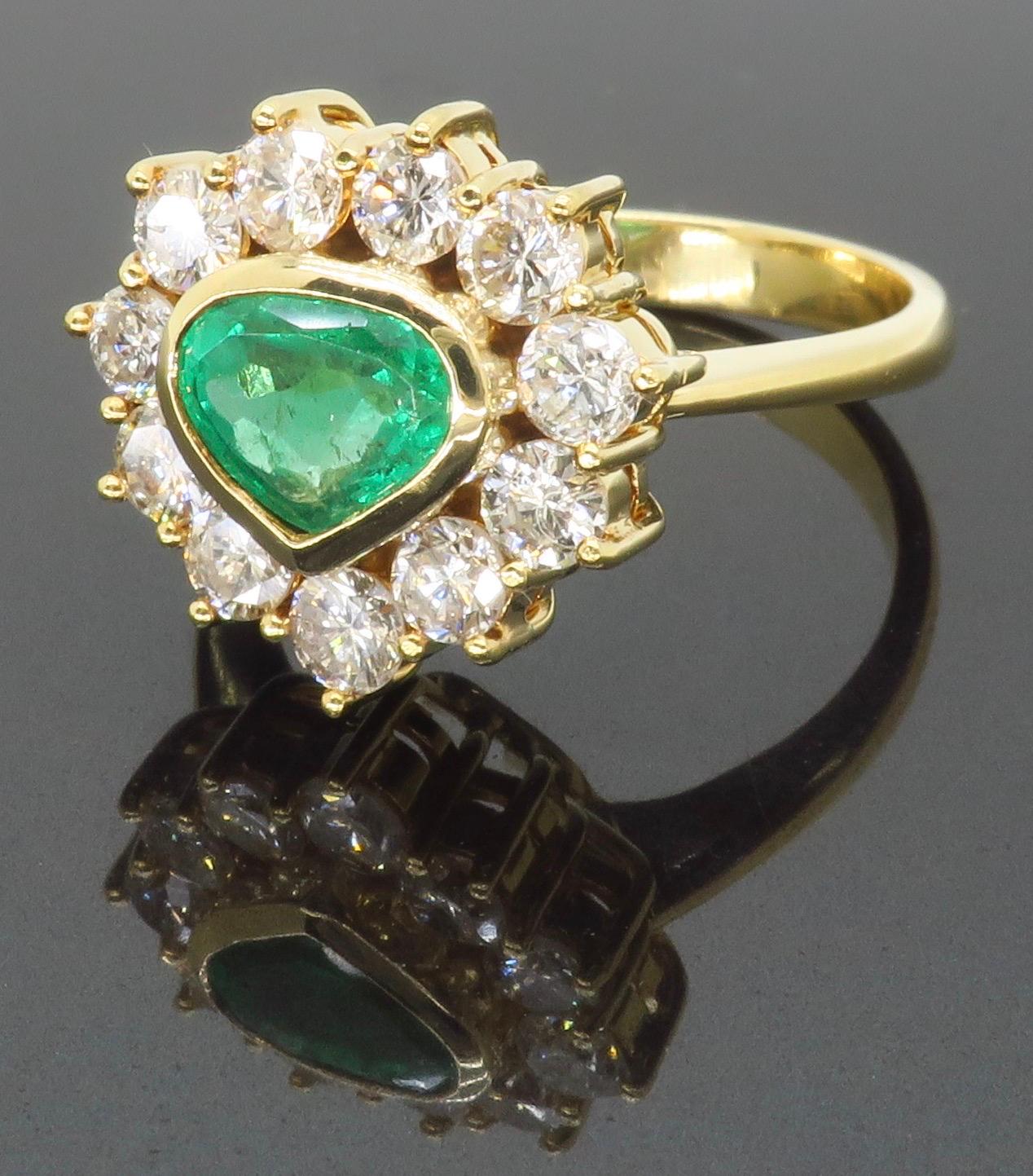 Unique 18k Yellow Gold Emerald & Diamond Halo Ring For Sale 3