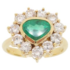 Unique 18k Yellow Gold Emerald & Diamond Halo Ring