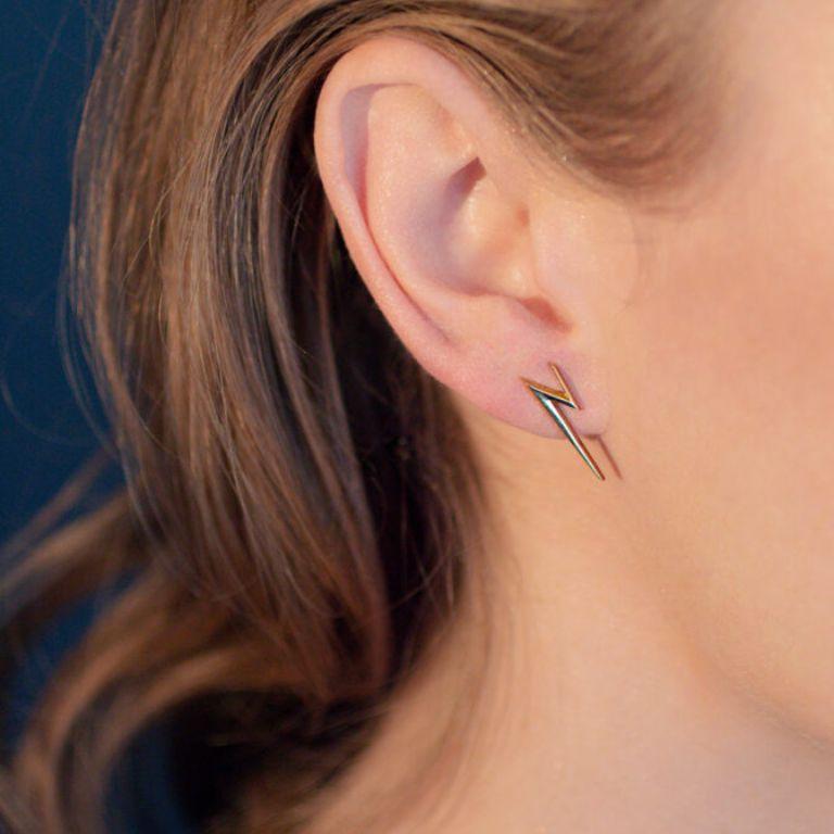 A unique, edgy gold statement earrings design crafted for those who value pieces that are both easy to wear and bold enough to make an impact. Handcrafted in 18 Carat Yellow Gold, these earrings offer the perfect balance between simplicity and