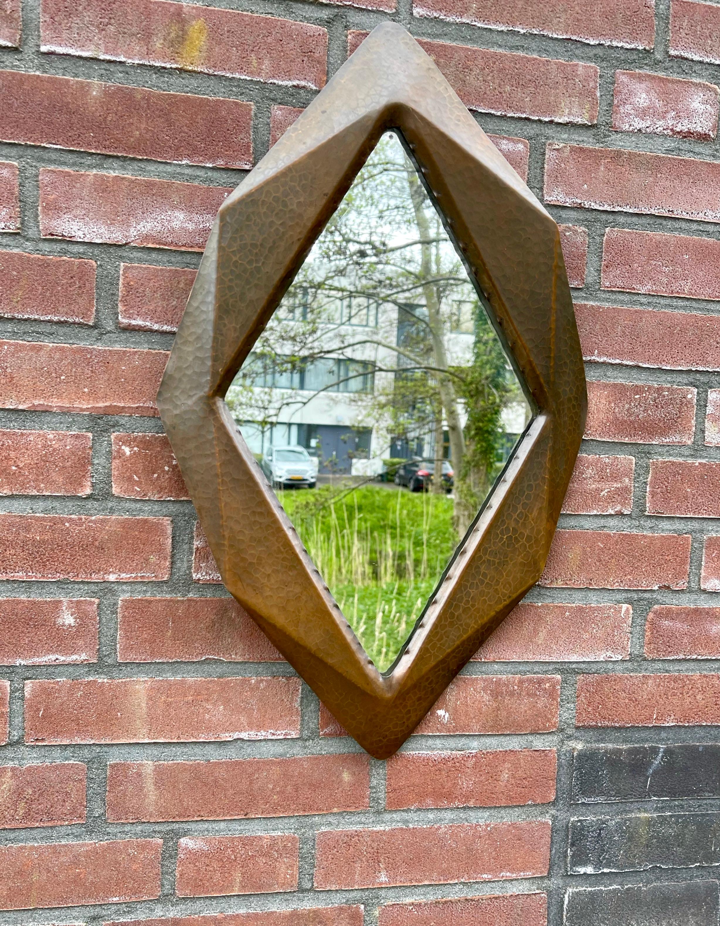 Arts & Crafts workmanship,  symmetrical design copper wall mirror of practical size.

Finding the right, period pieces for your Arts and Crafts interior can be a long and hard proces, but we may have the perfect (both in size and shape) mirror for