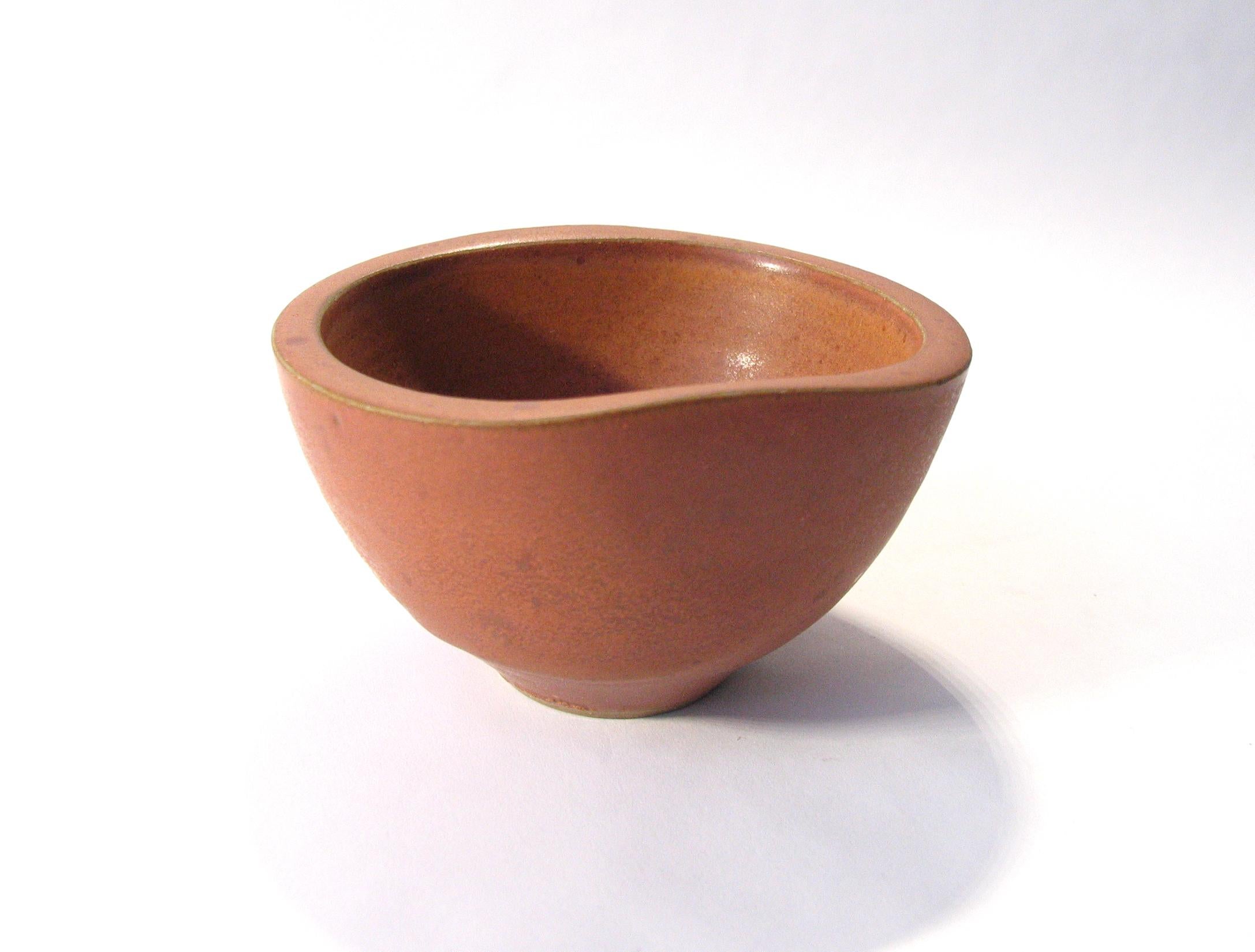Early unique Wilhelm Kage bowl with beautiful light brown speckle glaze, circa 1950s. handmade by Wilhelm Kage at Gustavsberg, Sweden, this piece has his hand signed signature right in to the pottery, and is very rare.