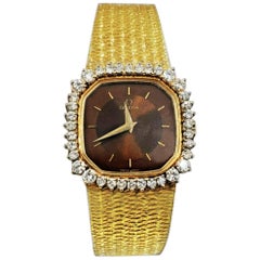 Omega 18 Karat Gold Diamond Set Double Tiger Eye Dial Bracelet Watch