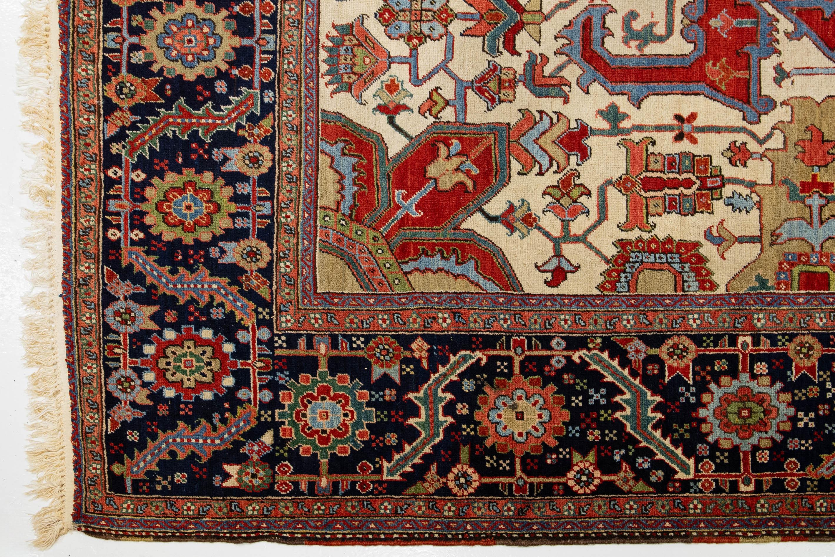Late 19th Century Unique 19th Century Persian Serapi Wool Rug Featuring a Red Medallion Design For Sale