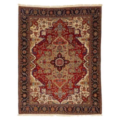 Unique 19th Century Persian Serapi Wool Rug Featuring a Red Medallion Design