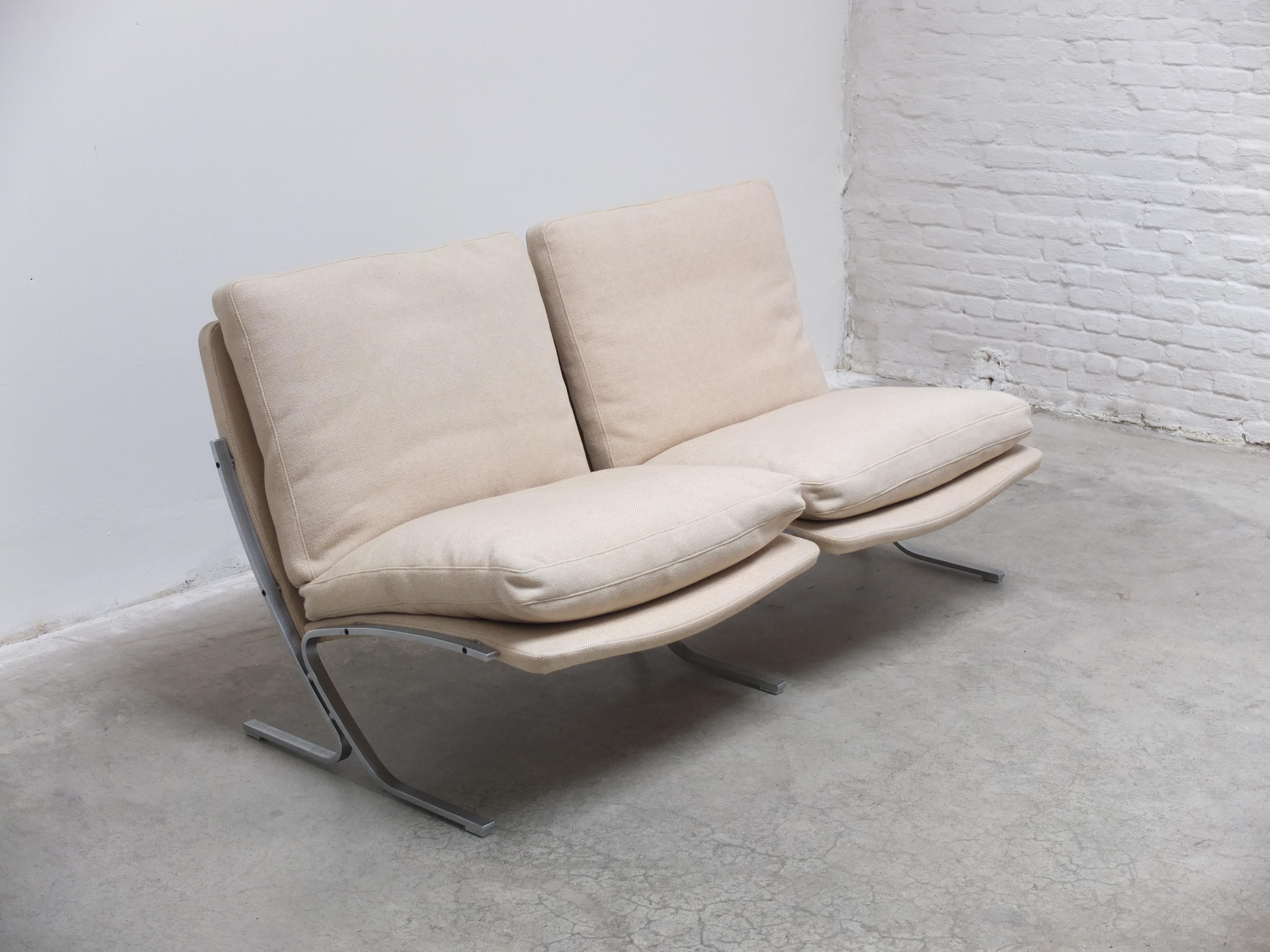 Unique 2-seater sofa produced in Germany around 1960. I have not confirmed a designer yet but it has a lot of similarities with the works of Preben Fabricius and Jørgen Kastholm for Alfred Kill International. Either way a beautiful modernist design