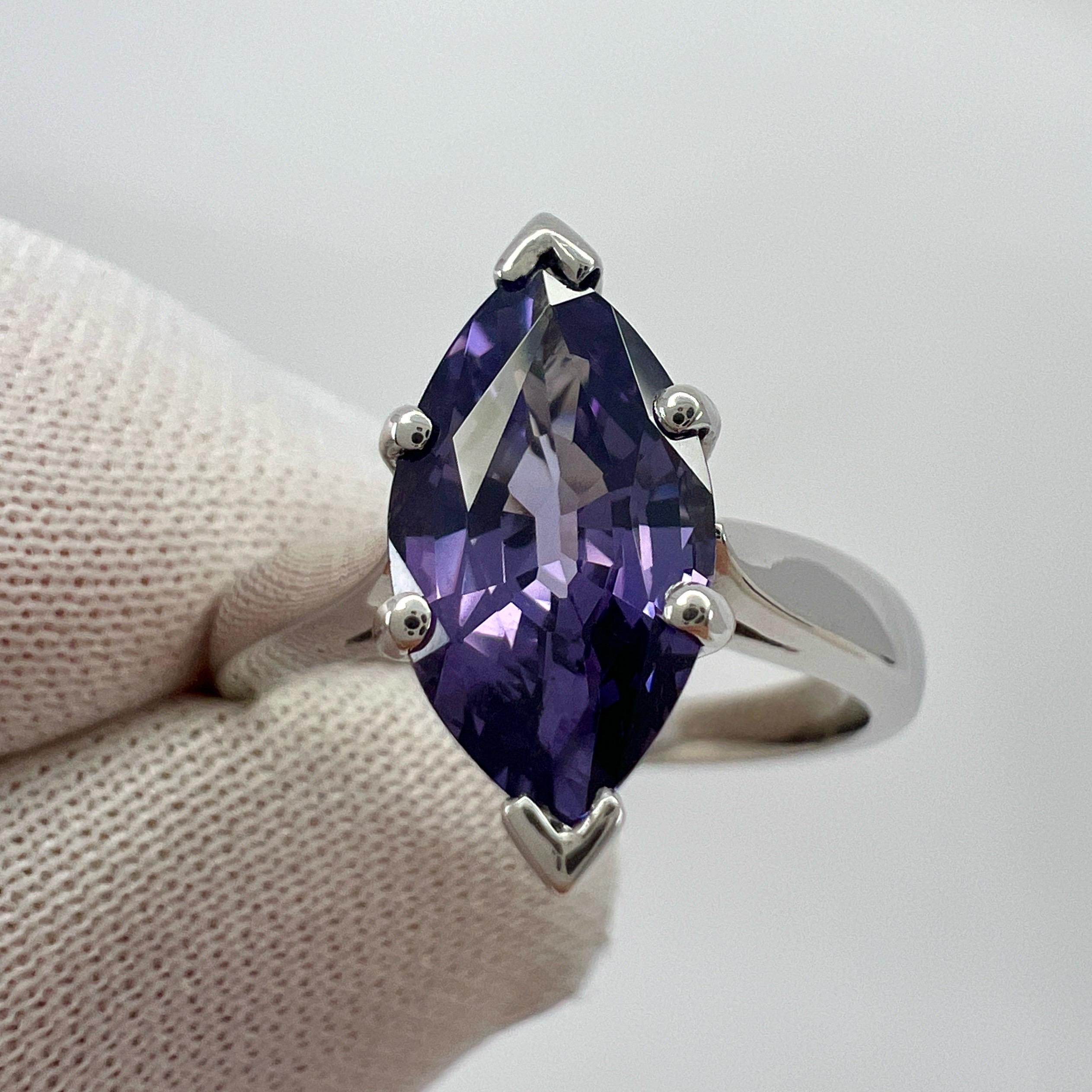 Fine Natural Vivid Purple Violet Spinel 18k White Gold Solitaire Ring.

2.13 Carat Spinel with a stunning vivid purple violet colour and excellent clarity. Unique and top grade stone.

The spinel also has an excellent marquise/navette cut which