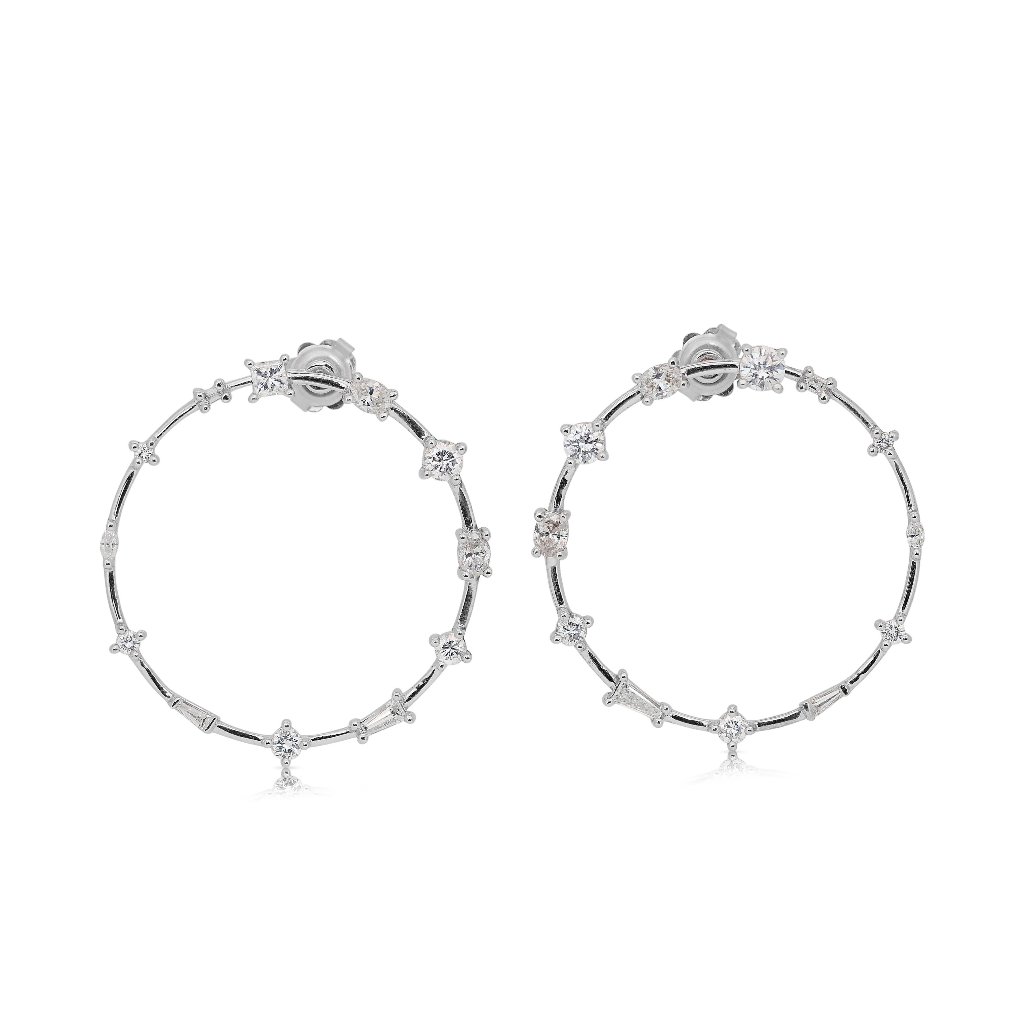 Unique 2.39ct Diamonds Hoop Earrings in 18k White Gold - IGI Certified

Indulge in the luxurious allure of these 18k white gold hoop earrings, a dazzling testament to fine craftsmanship and elegance. Each earring is adorned with a variety of