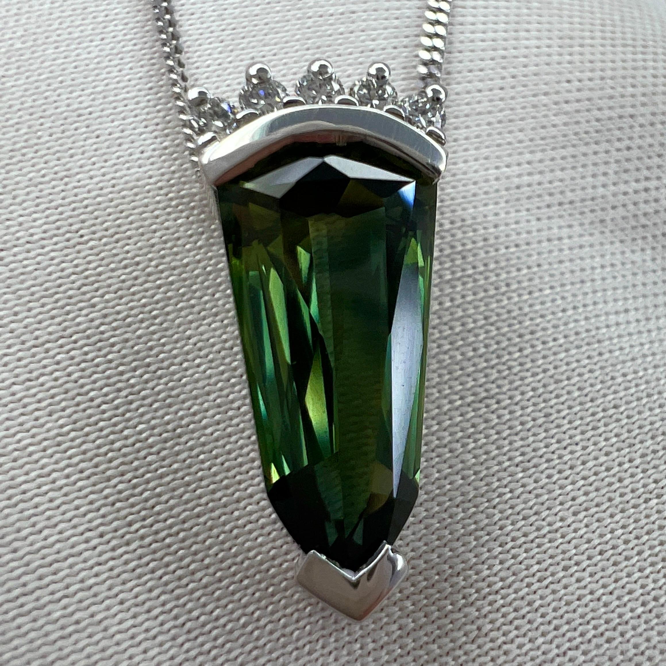 Fine Vivid Green Fancy Cut Australian Sapphire & Diamond 18k White Gold Pendant Necklace.

Unique 2.70 carat sapphire with a vivid green colour and excellent clarity, very clean stone.
The sapphire also has an excellent fancy cut which shows lots of