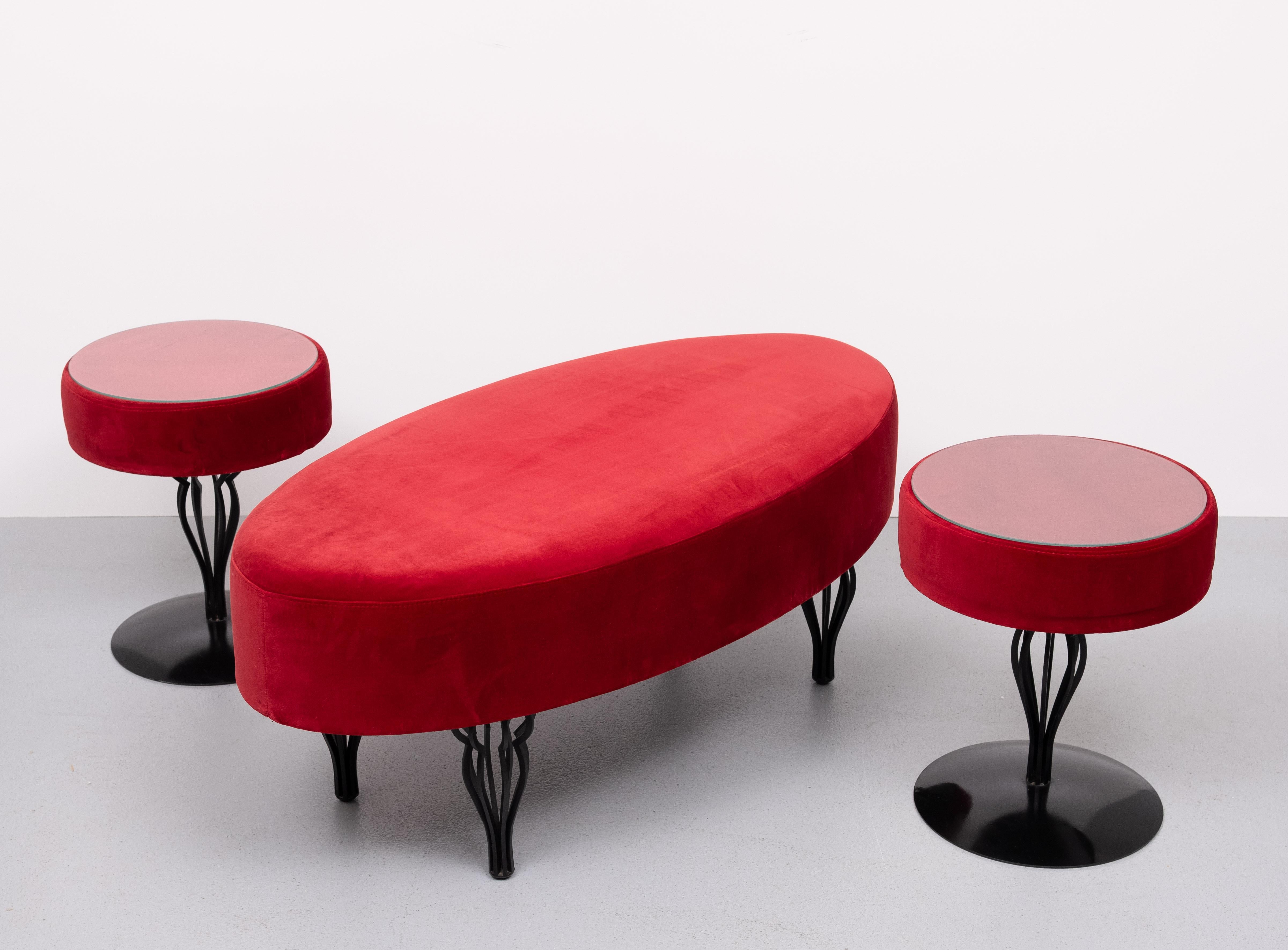 Unique Bedroom furniture set  . 2 nightstands or Tables .Model ''Farfisa''  With 
new clear glass tops .Organic Black Metal feet . 
Comes with the matching Oval shaped canapé . In a Red Velvet upholstery . 
Manufactured by Gelderland Top quality