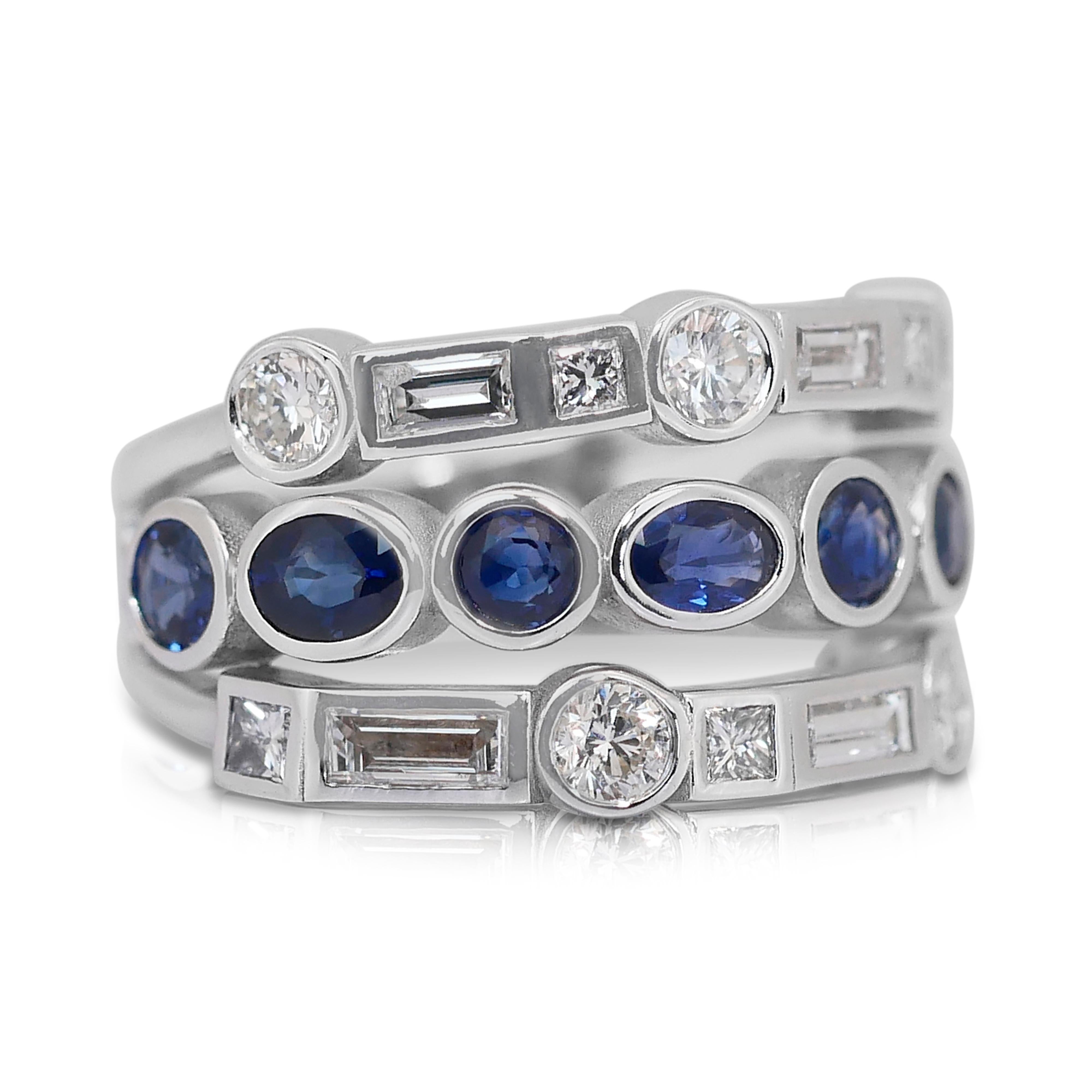 Unique 3.18ct Sapphires and Diamonds Ring in 14k White Gold - IGI Certified

This stunning 14K white gold ring is a true masterpiece featuring a captivating blend of blue sapphires and dazzling diamonds. The ring is adorned with four oval-cut blue