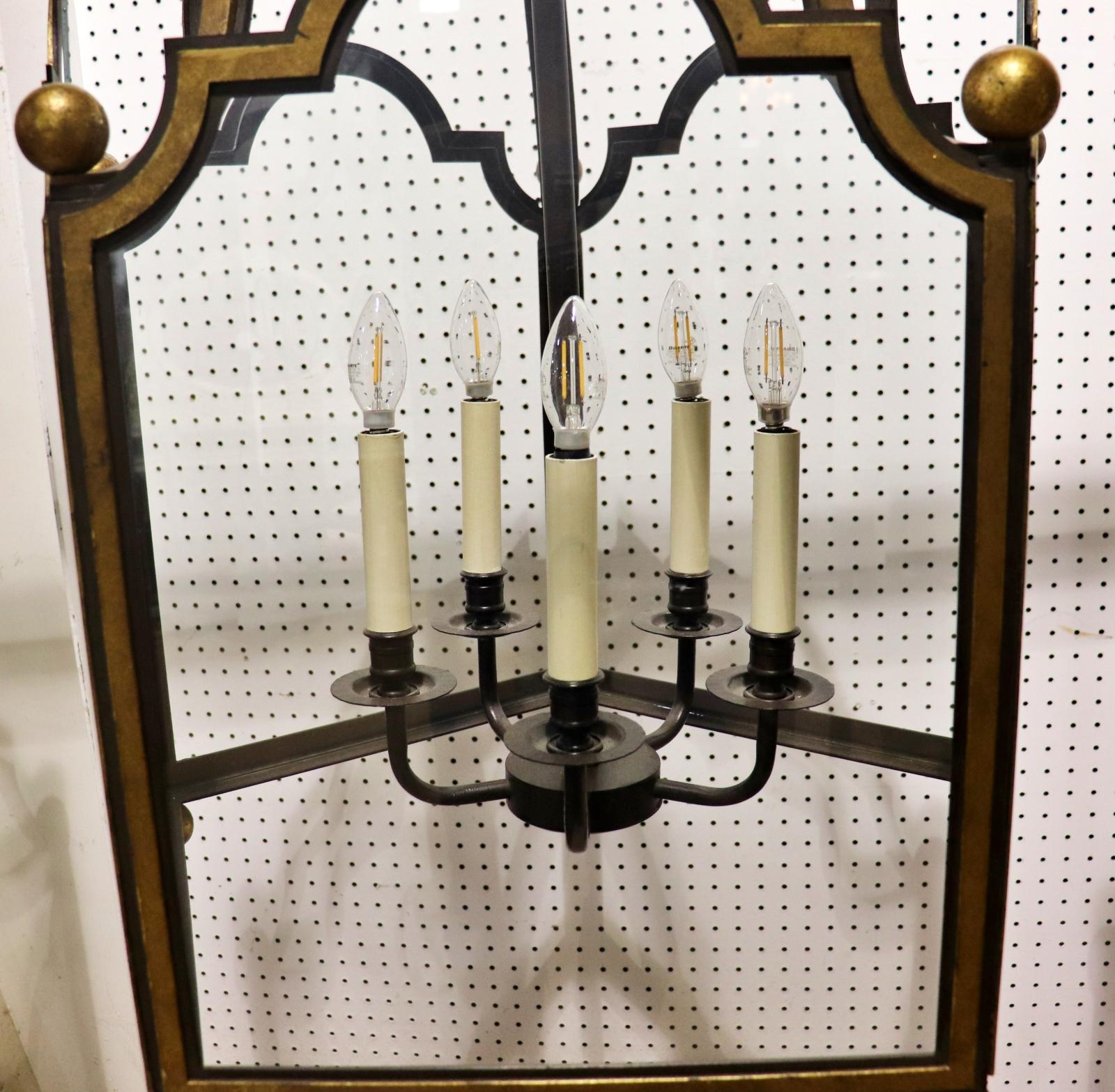 one of four all listed separately 

Gilt metal. 5 glass panels. 5 candlestick lights.  44 1/2