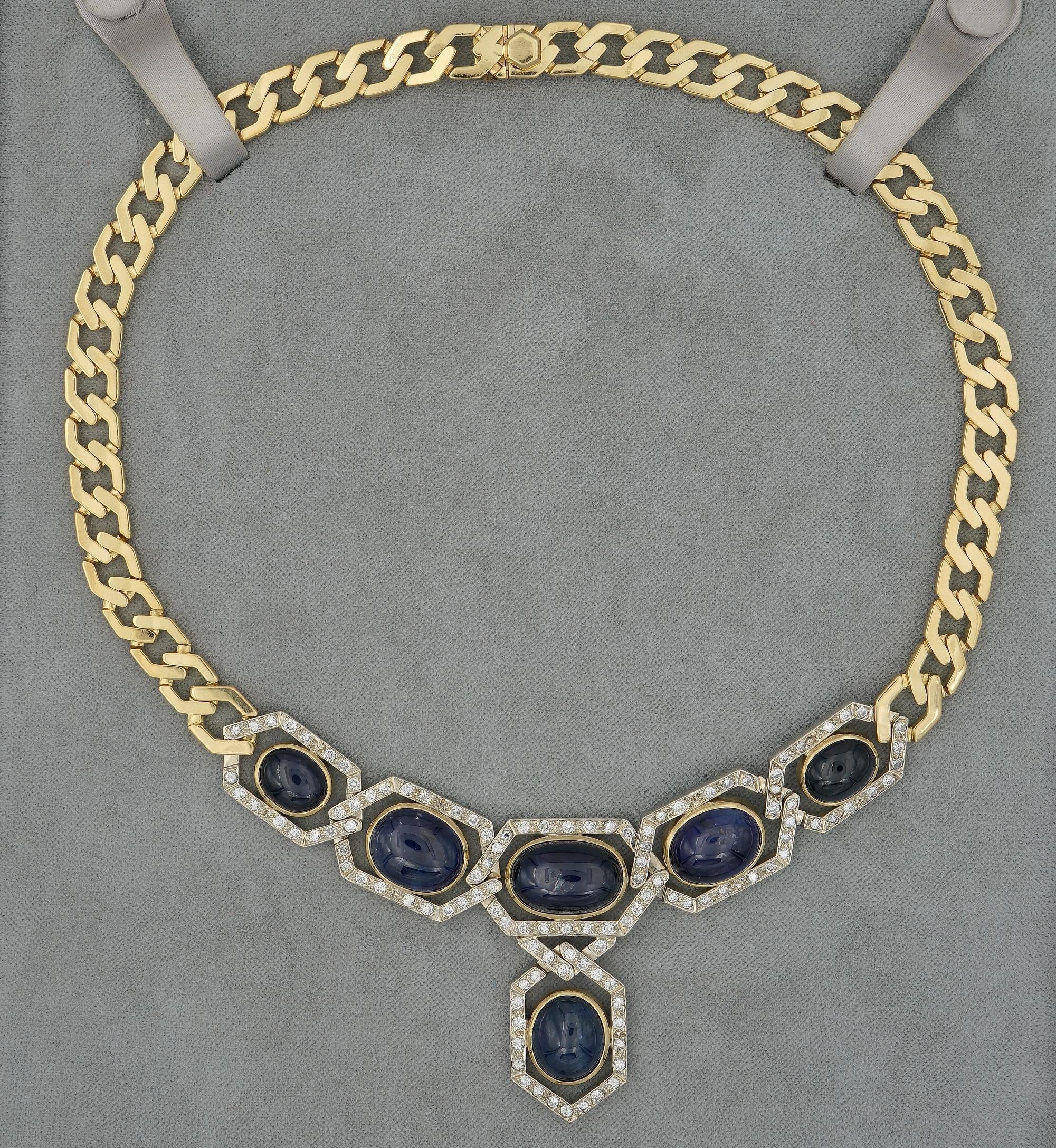 This sensational Sapphire & Diamond necklace is 1970 ca.
Bold and chic, hand tailored during the 70’s  as unique of solid 18 KT gold– Italian origin
Weighs 80.6 grams
Appealing design in vogue at the time costing in a thick curb chain and a main