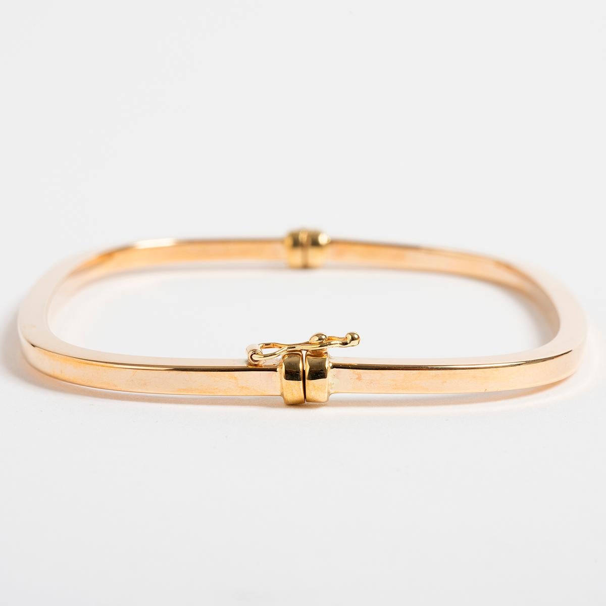 Unique 9 Carat Yellow Gold Hollow Hinged Bangle For Sale at 1stDibs