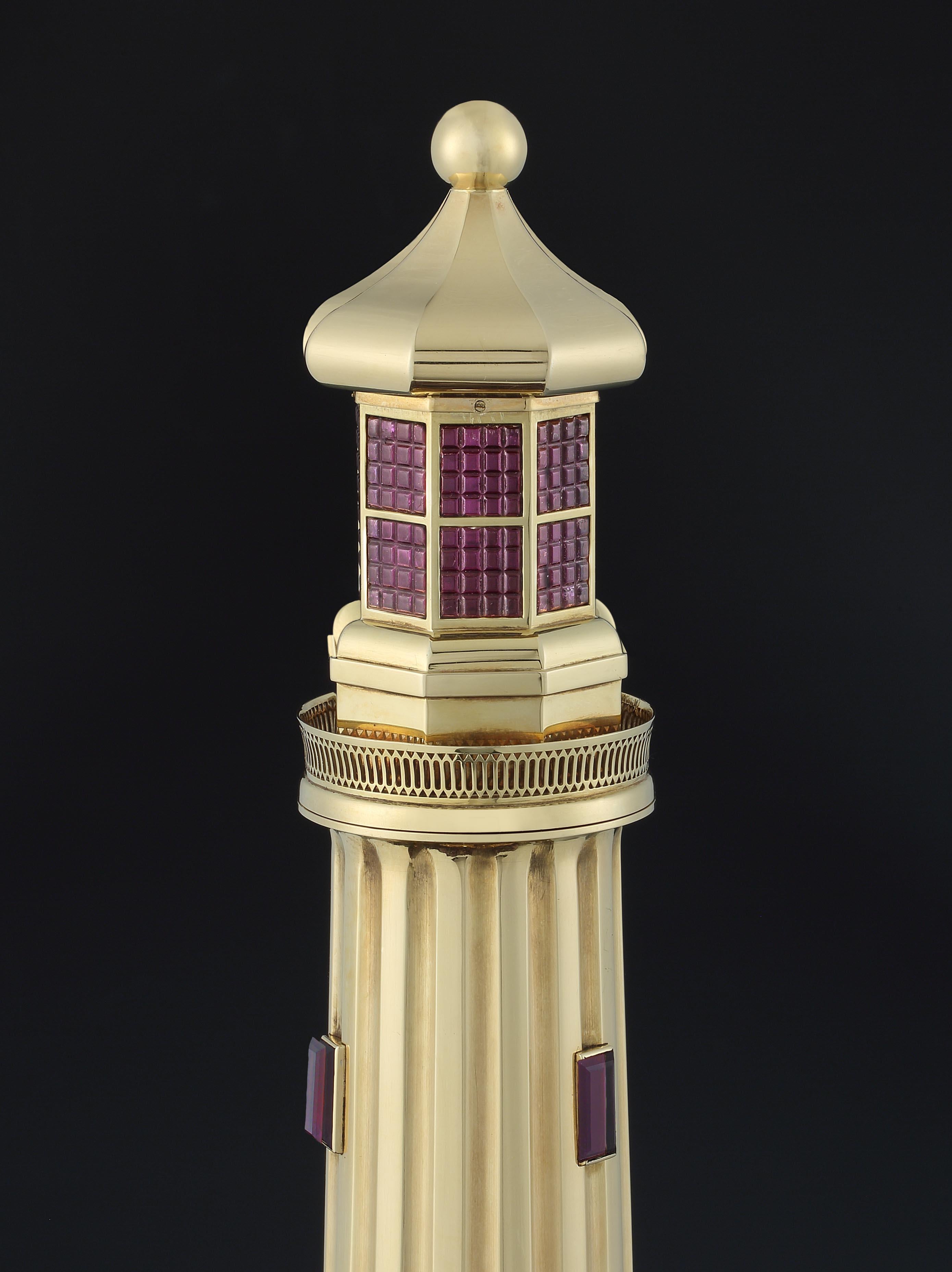 Dedication and great skill are what you need to create a unique piece of this extraordinary quality – a massive 18ct gold (over 1.5 kilos) and amethyst table lighter in the form of a Lighthouse. It is set on top of a solid section of amethyst geode,