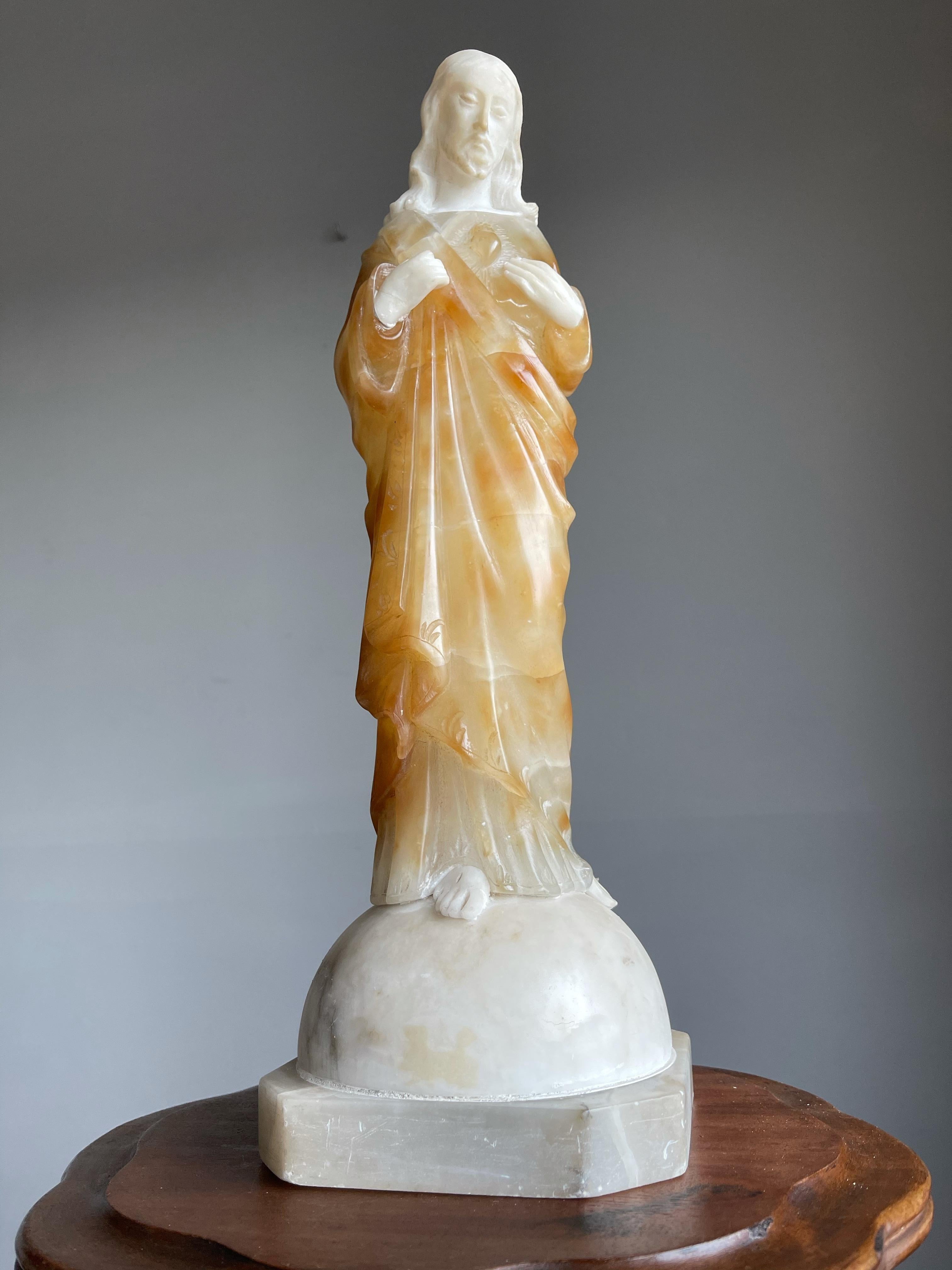 Striking and meaningful work of religious art.

This beautifully hand carved and good size Sacred Heart of Christ statuette is another one of our recent great finds. In our view the sculptor has perfectly managed to capture both the wisdom and