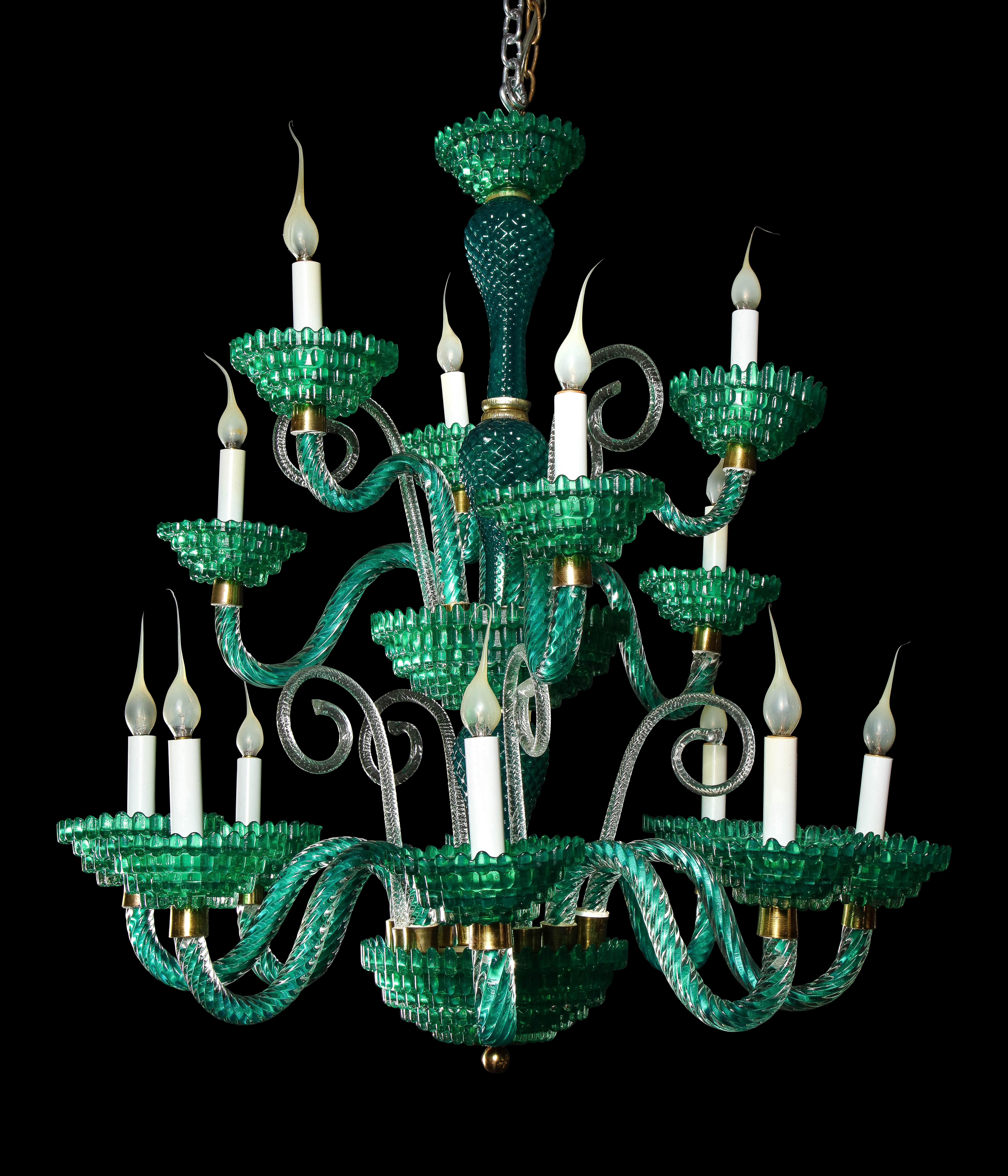 A unique large antique Italian Murano Art Deco green glass double tier multi light chandelier of unusual pattern and exquisite craftsmanship.