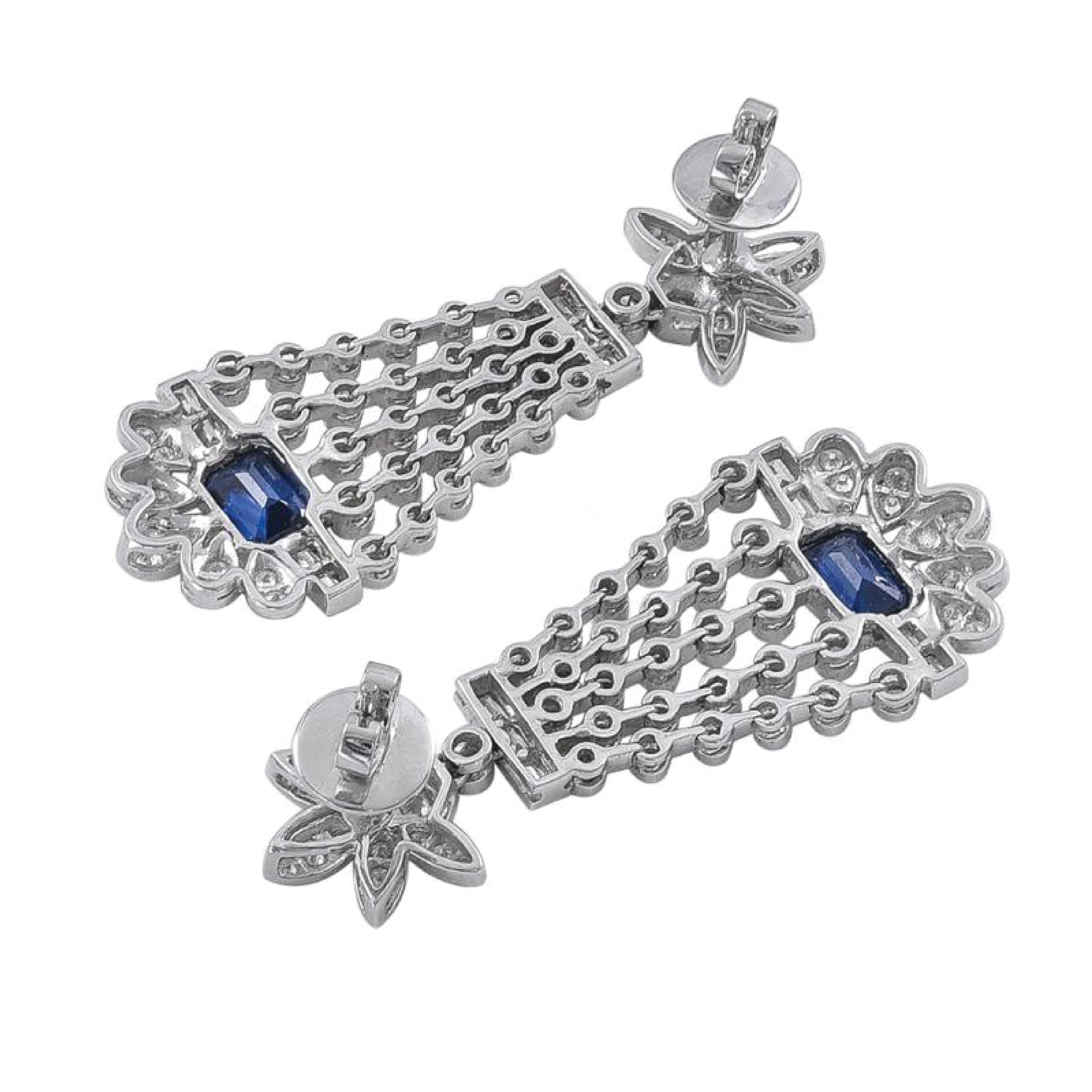 Unique and modern designed platinum earrings that features a sapphire center weighing 1.83 carats surrounded by gorgeous fancy cut diamonds weighing a total 2.47 carats.

Sophia D by Joseph Dardashti LTD has been known worldwide for 35 years and are
